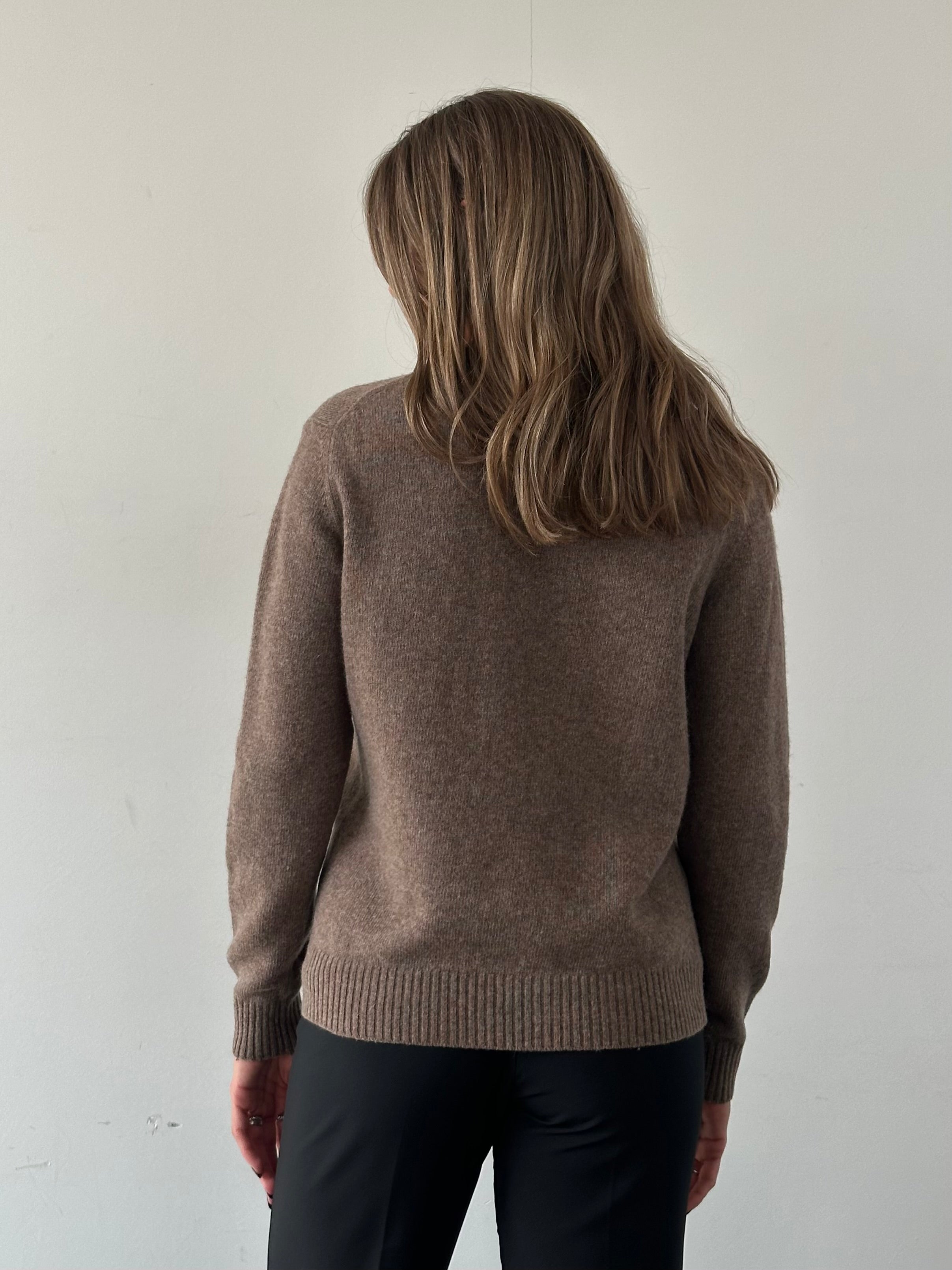 Trussardi wool crew neck jumper in size M, showcasing a soft, grey knit fabric with a classic fit and ribbed cuffs.