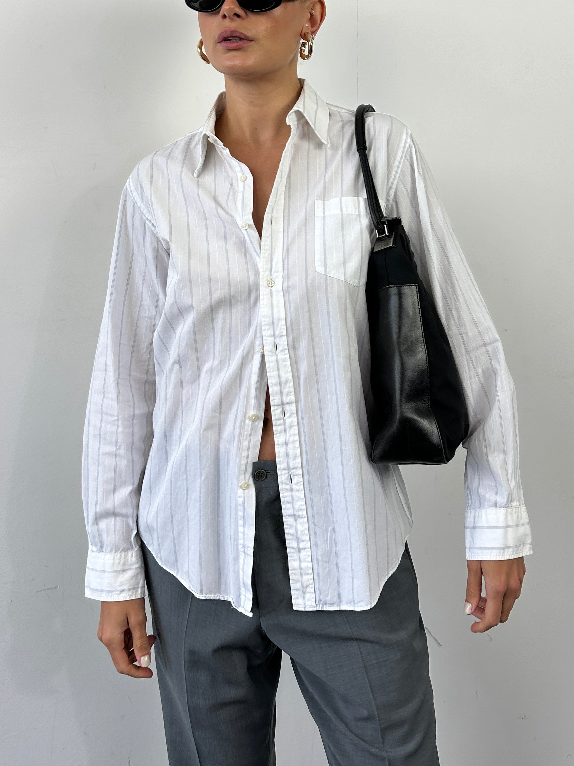 Yves Saint Laurent pinstripe pure cotton shirt in size M, featuring classic design and tailored fit, displayed on a hanger.