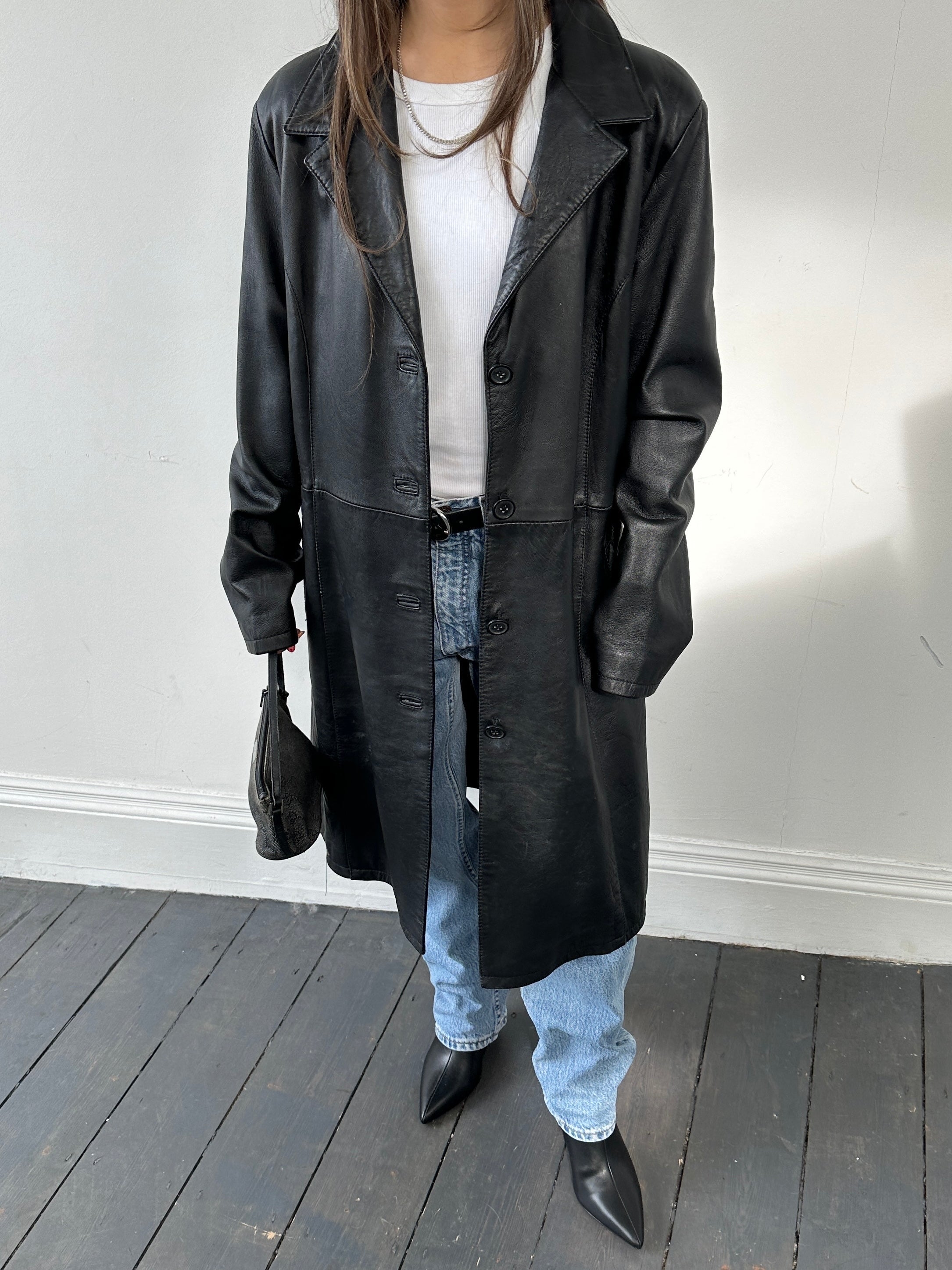 Italian vintage leather jacket in size small featuring classic design and rich brown tone, made by Vintage brand.