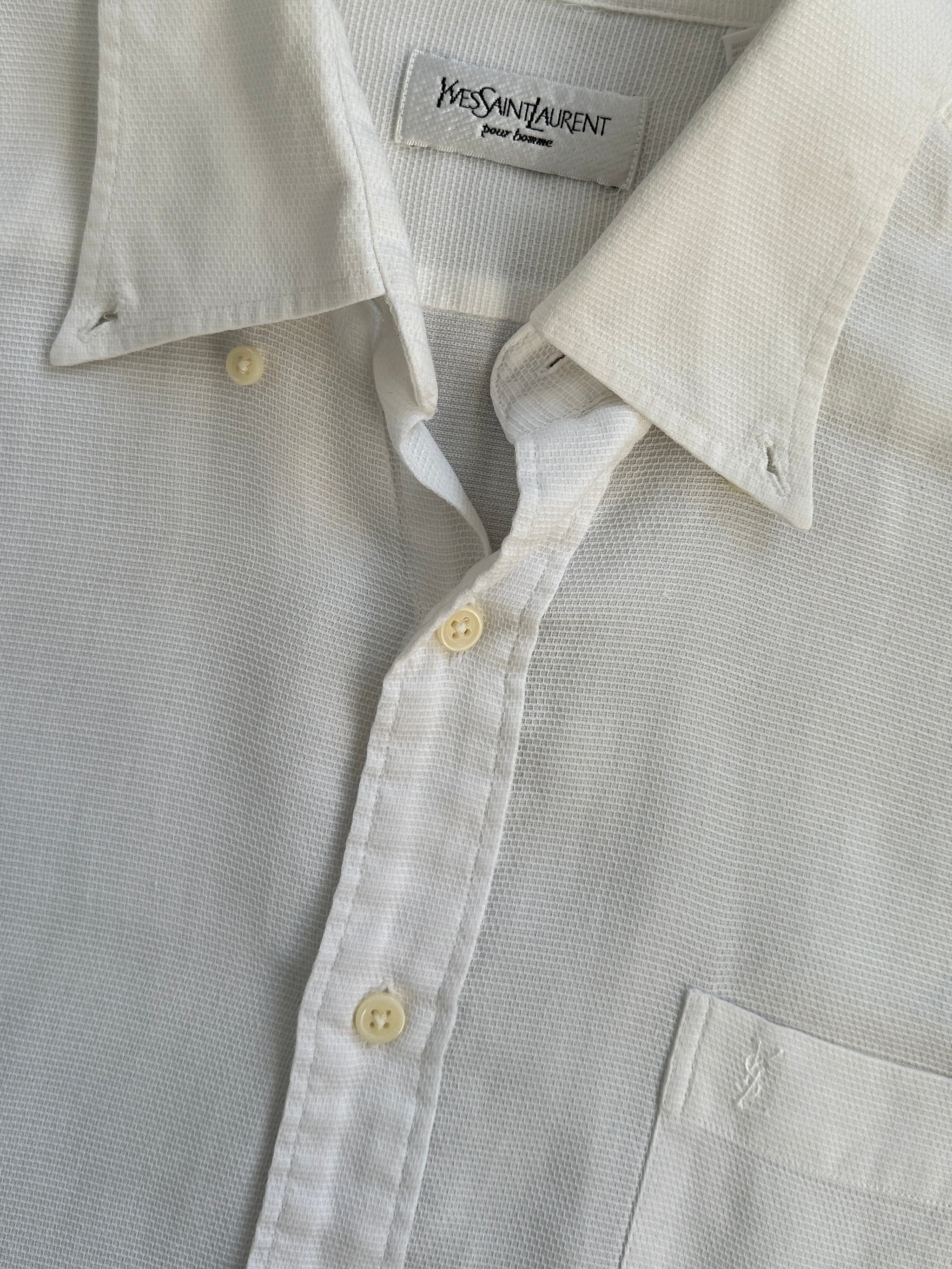 Yves Saint Laurent Pour Homme cotton logo shirt in size M/L, featuring a classic design and the brand's signature logo on the front.