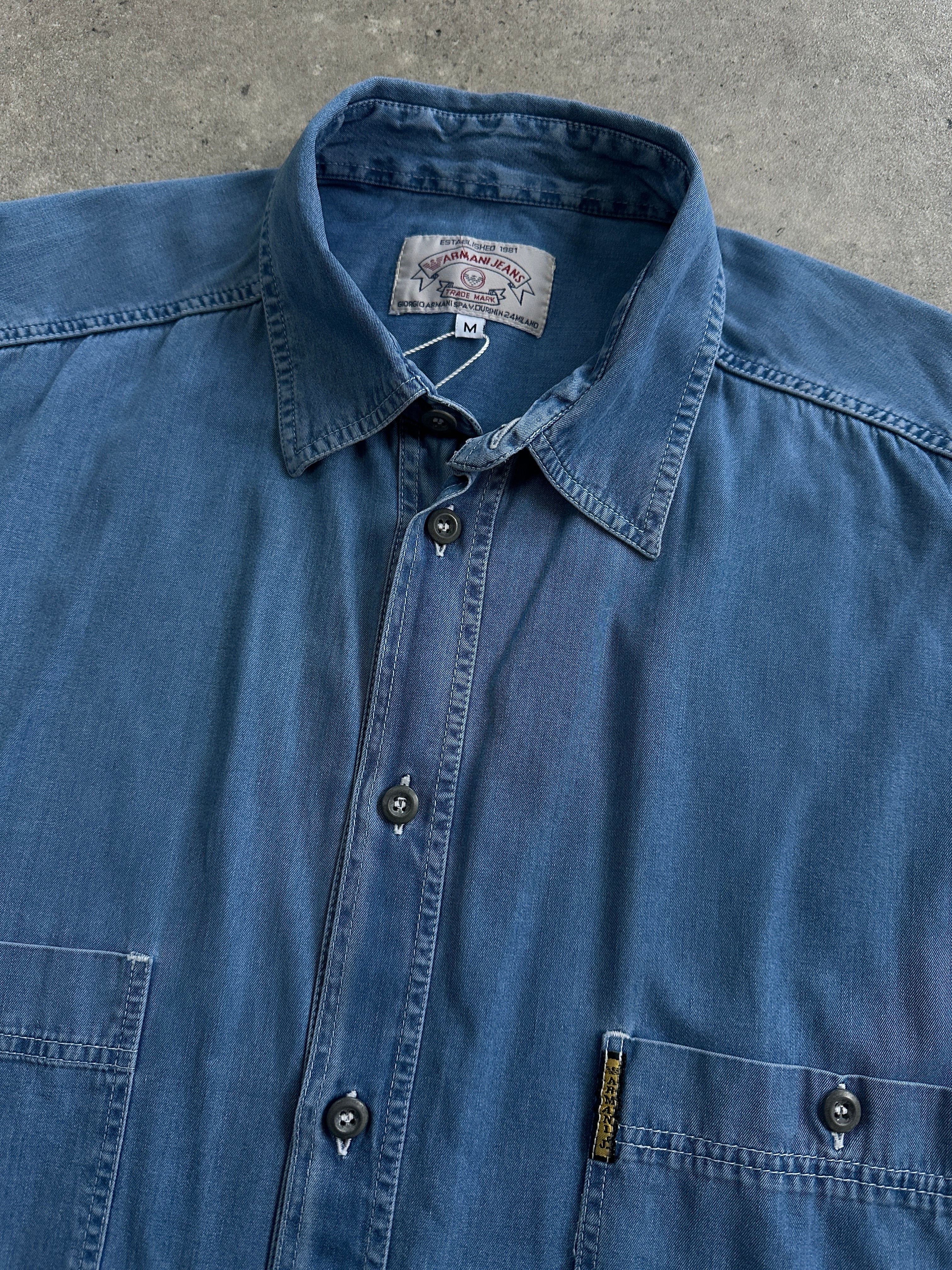 Armani Jeans denim logo shirt in XL, featuring classic denim fabric and Armani branding on the chest.
