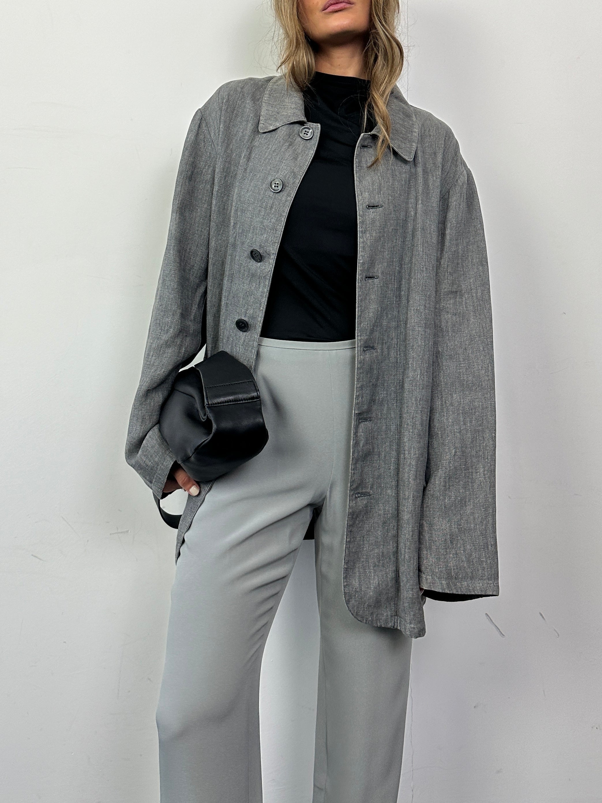 Armani Collezioni relaxed pure linen bomber jacket in XL, lightweight and casual, shown in a natural fabric close-up.