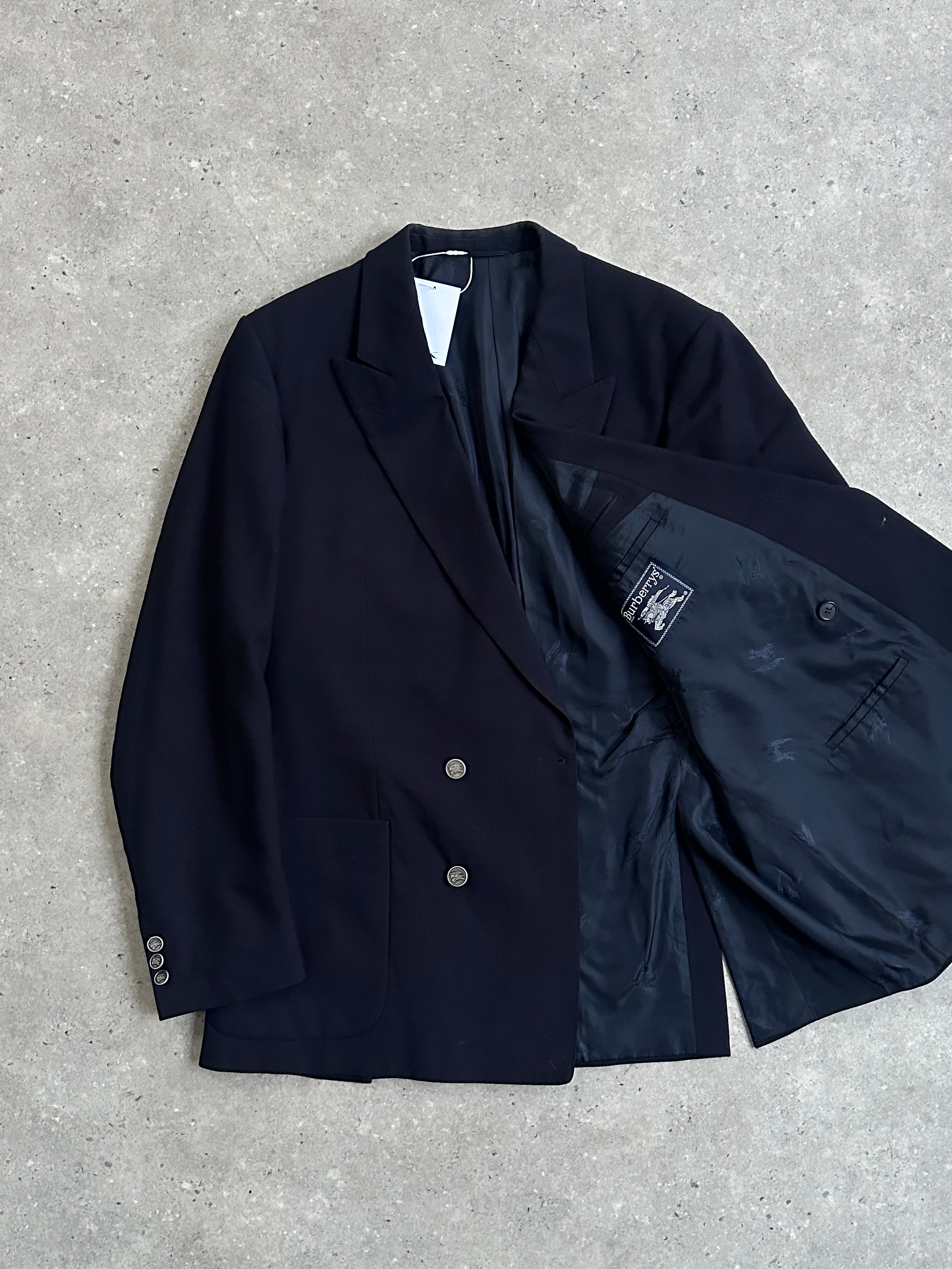 Burberry wool double-breasted blazer in size 44R/XL with tailored fit, featuring classic button details and a sophisticated design.