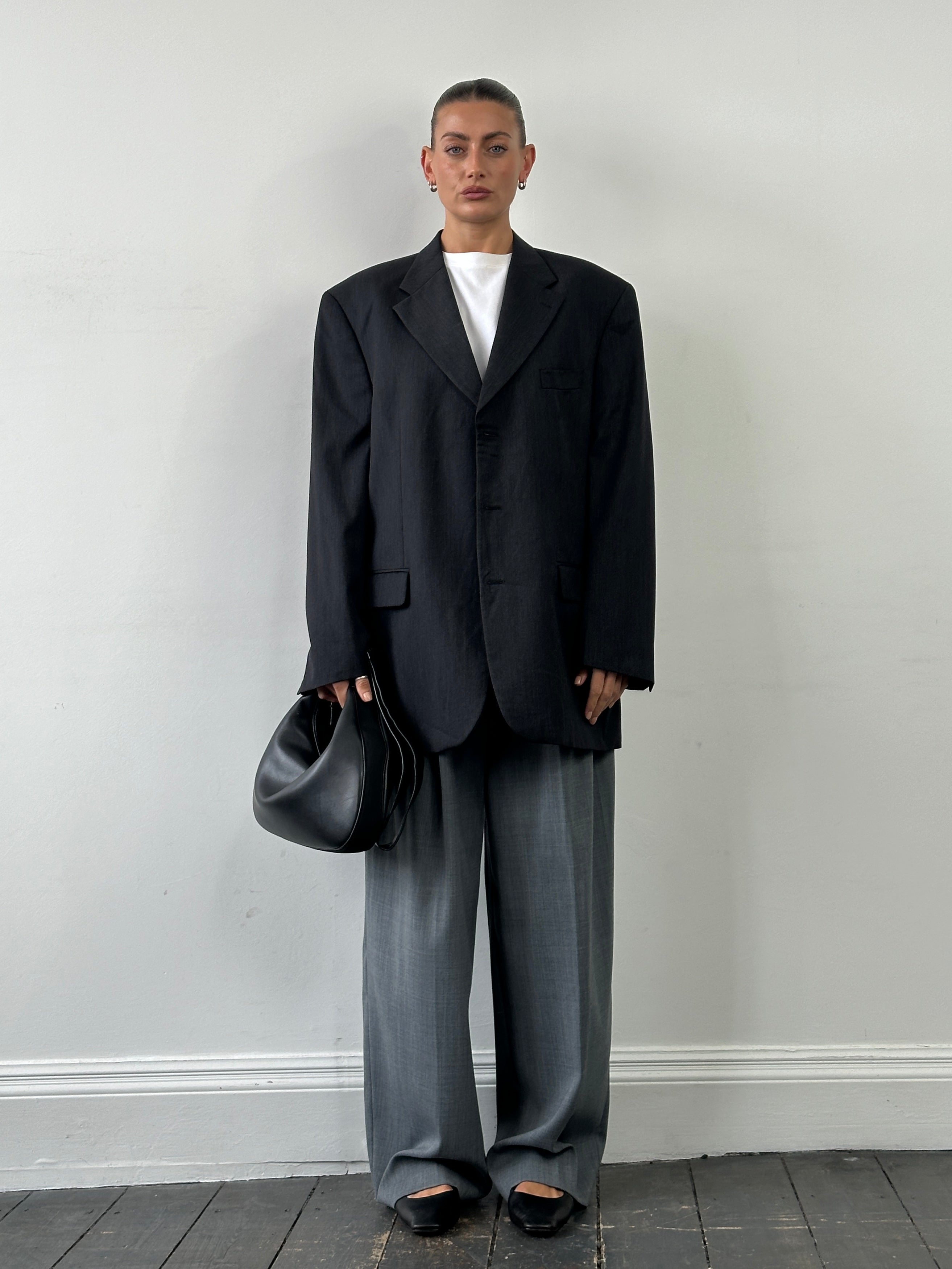 Yves Saint Laurent Pour Homme 1990s pure wool single-breasted blazer in size 48R/XXL, dark tailored men's blazer with notch lapels.