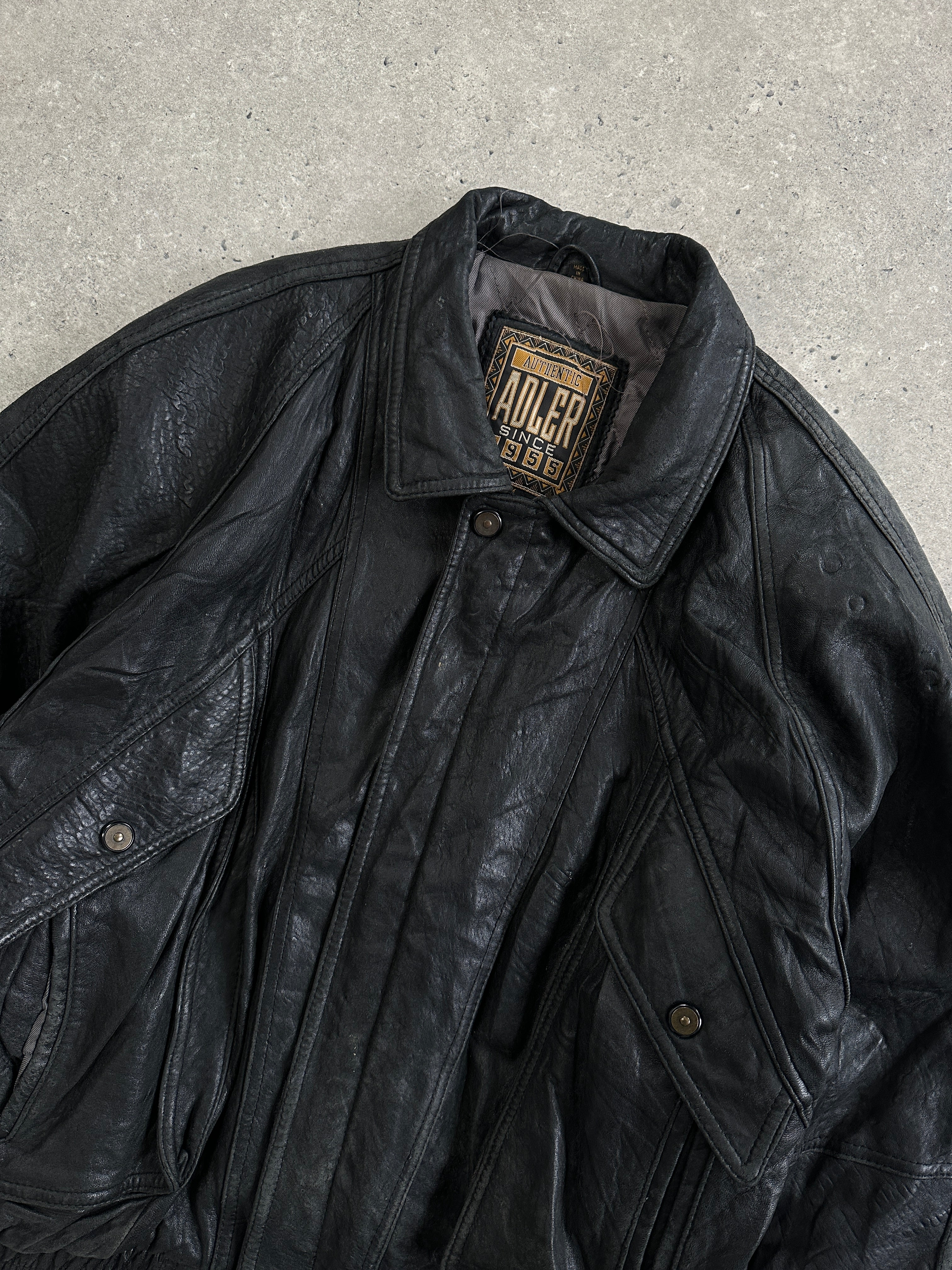 Vintage distressed leather bomber jacket in size large with rugged details and classic style, from the Vintage brand.