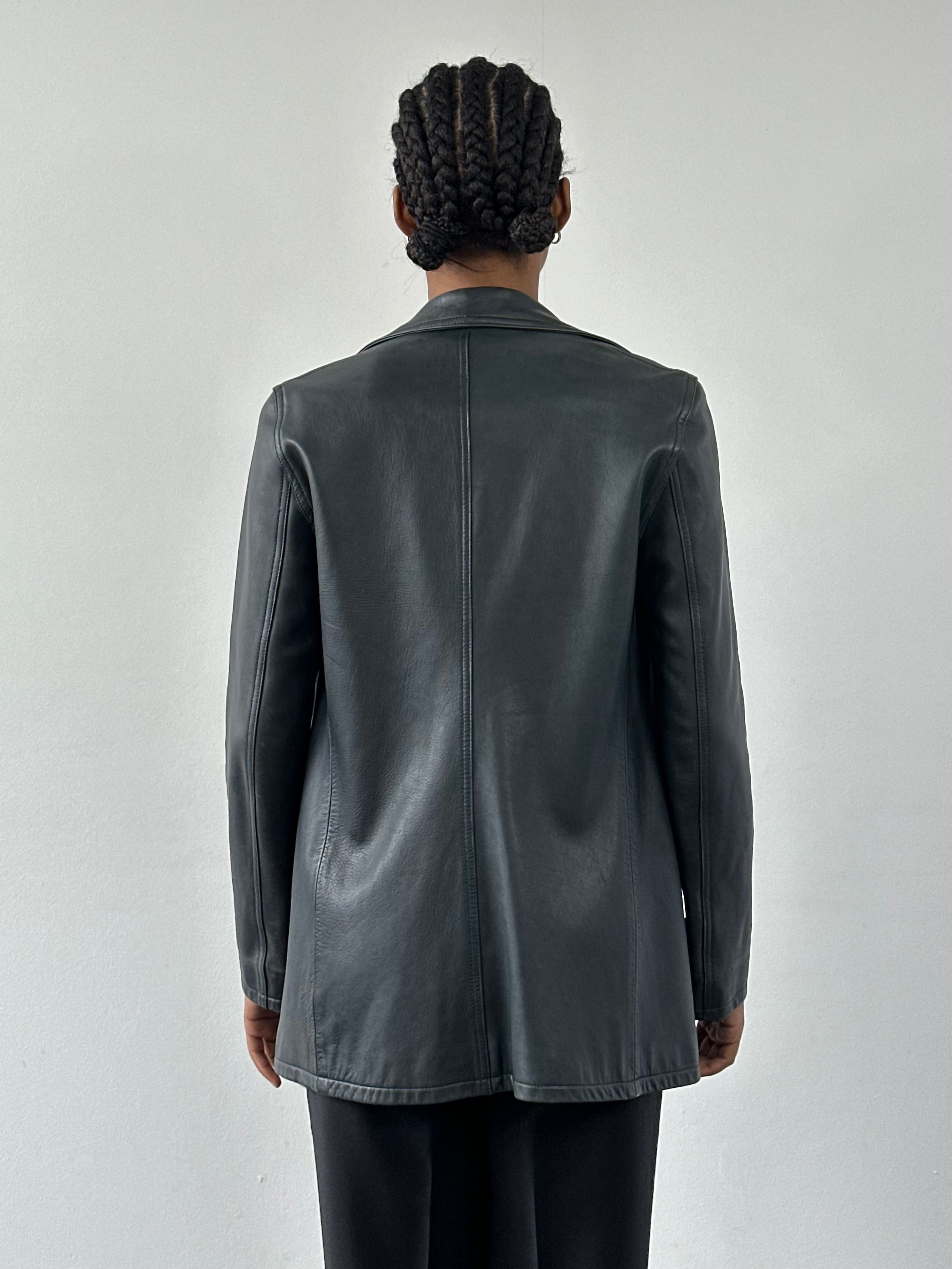 Jaeger 2000s double-breasted leather jacket in black, front view, with wide lapels and button details, size S/M.