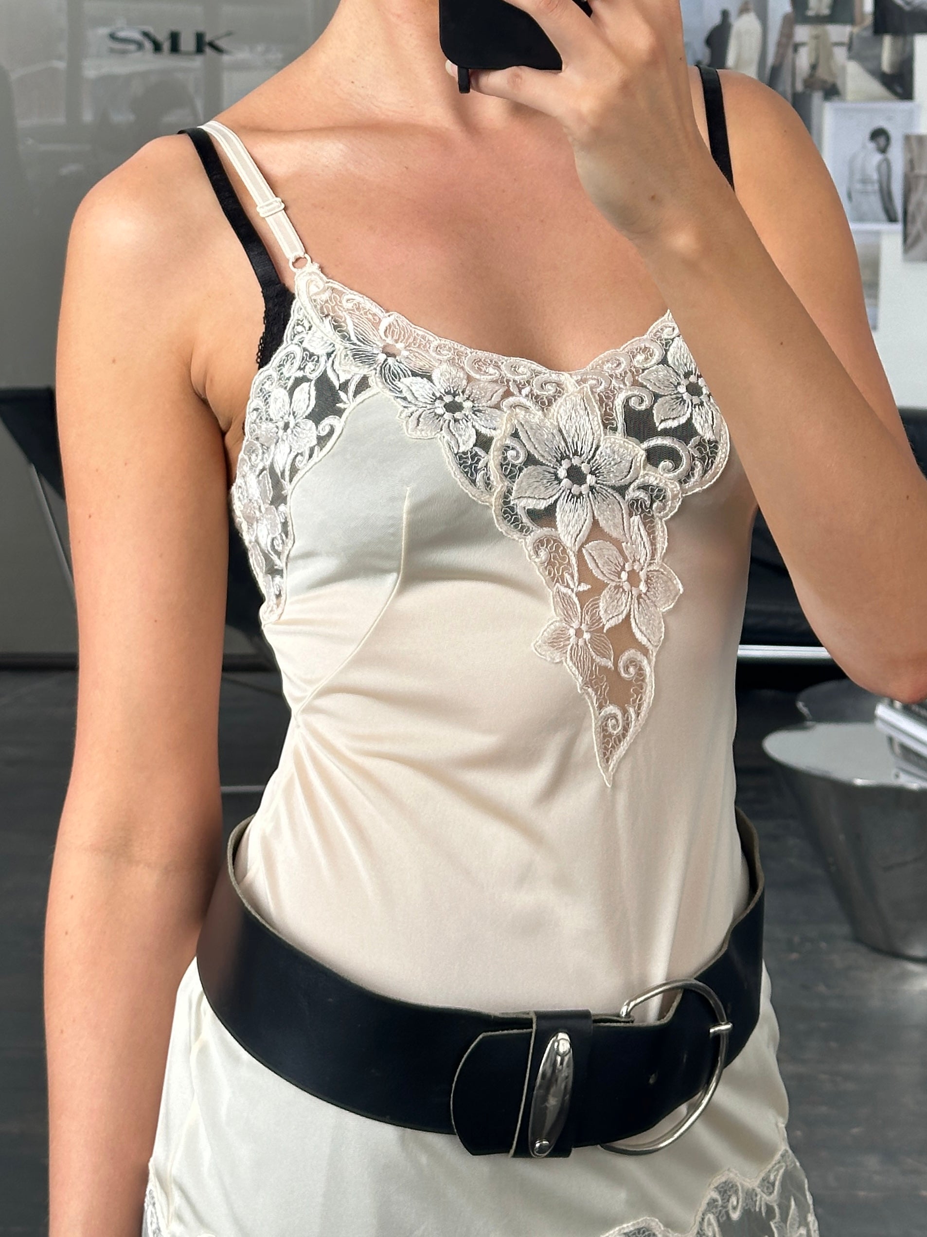 Vintage 1990s lace sheer mini slip dress, XS/S, featuring delicate lace fabric and vintage style.
