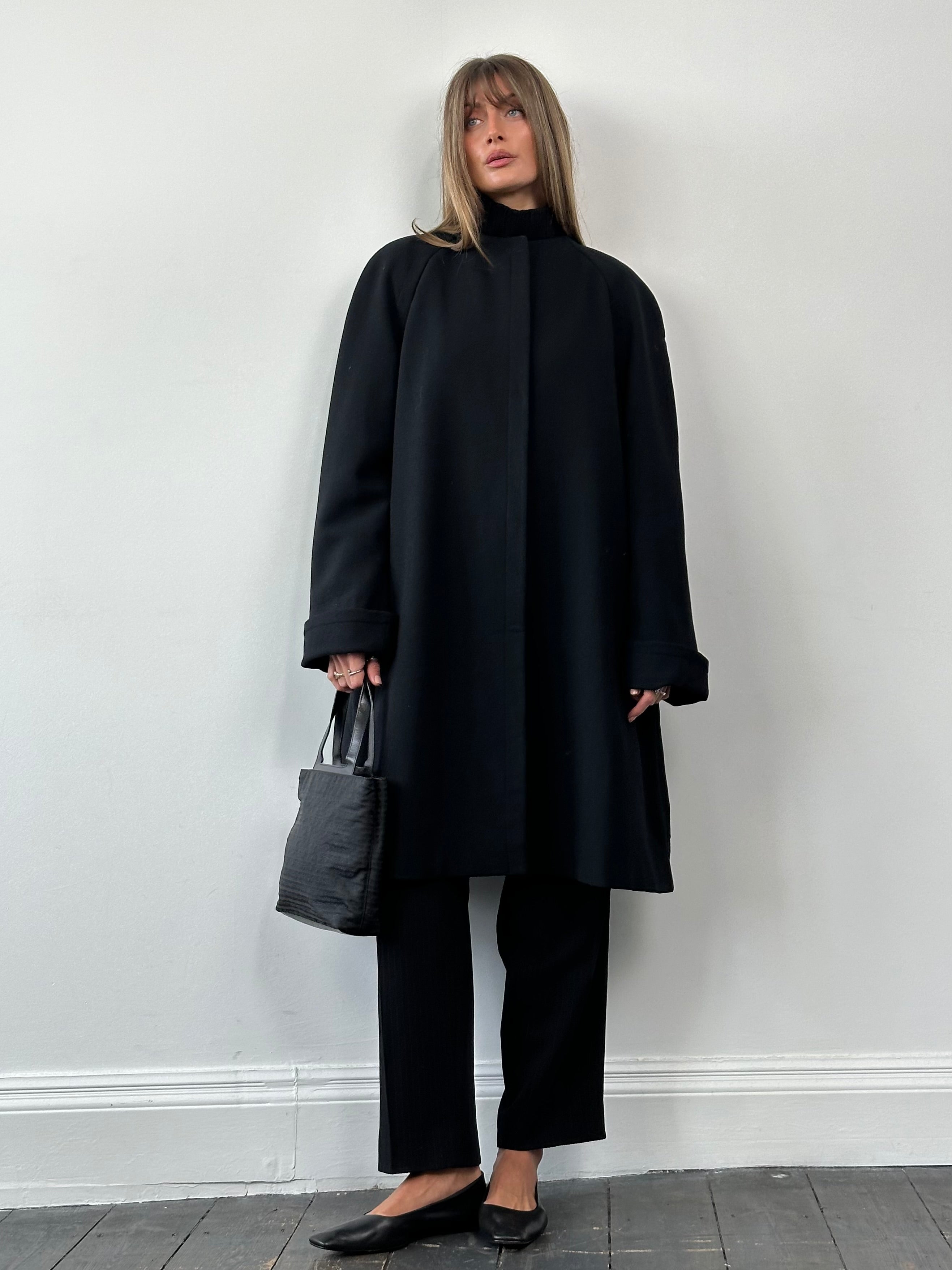 Gianfranco Ferre pure wool A-line coat with minimal collarless design in XL size, showcasing its sleek, tailored silhouette.