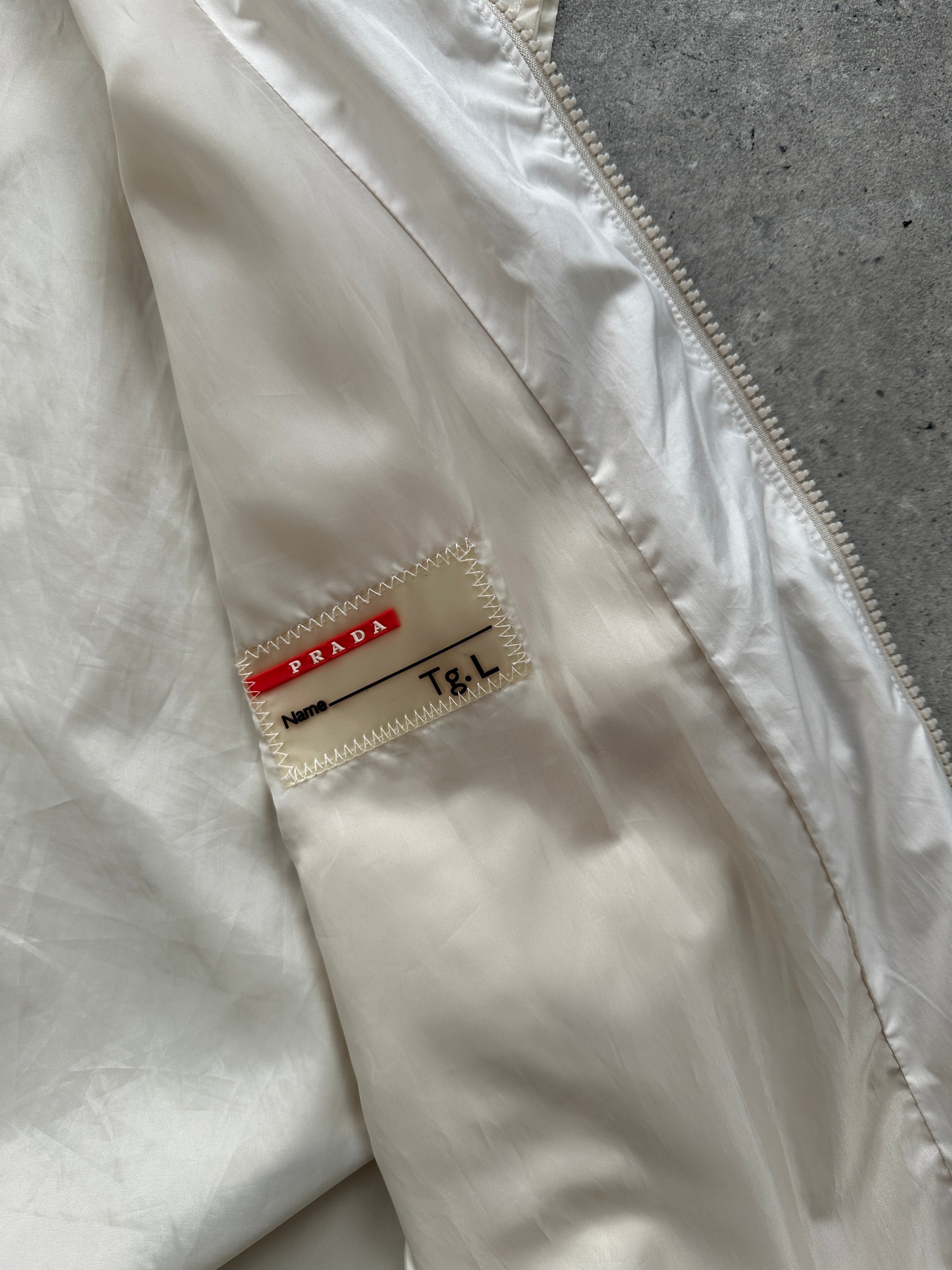 Prada sleeveless nylon vest with double zip closure, size XL, featuring a sleek, modern design and lightweight construction.