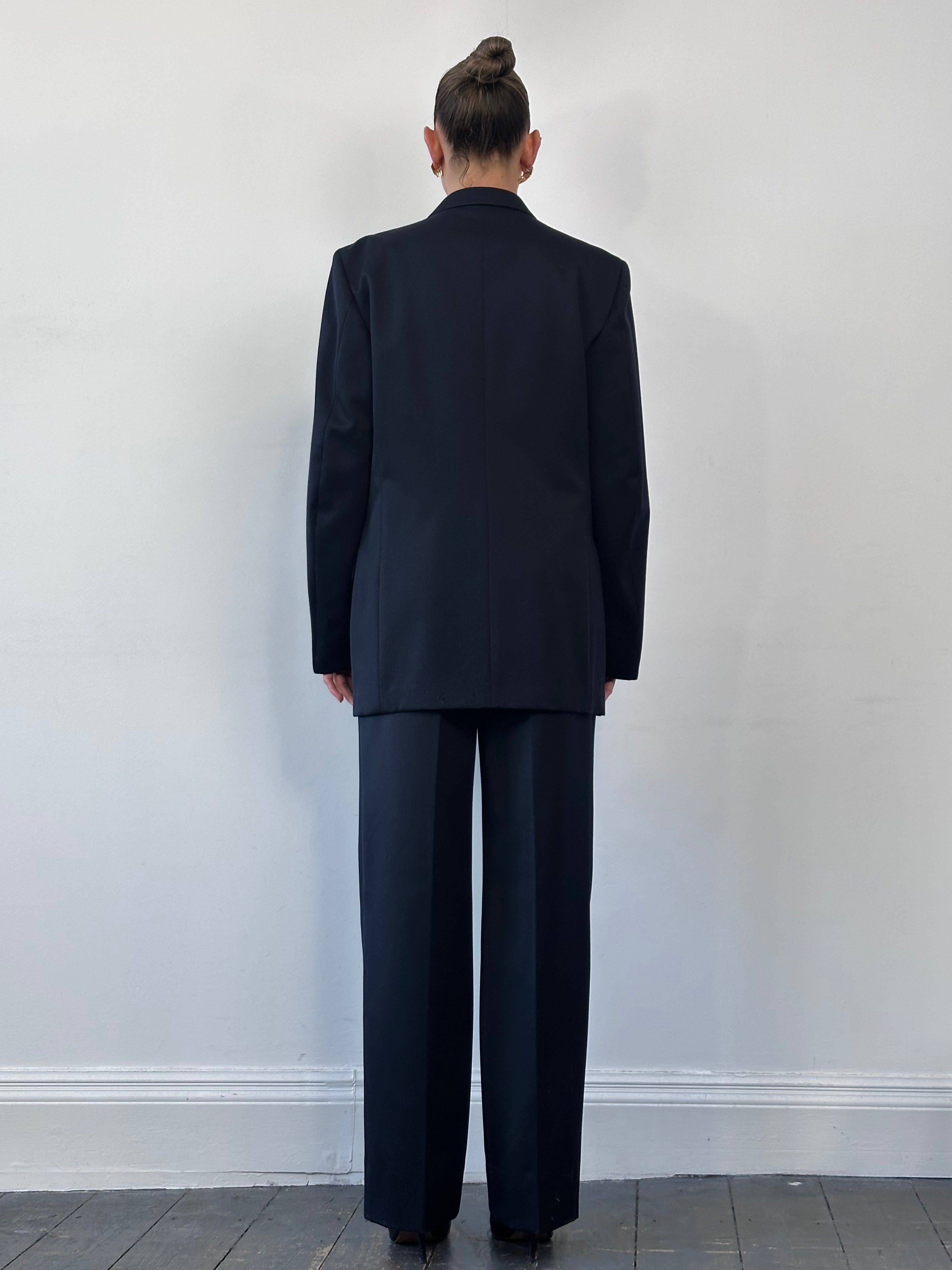 Vintage bespoke button wool double-breasted blazer in size 42L, classic tailored design with notch lapels and front pockets.