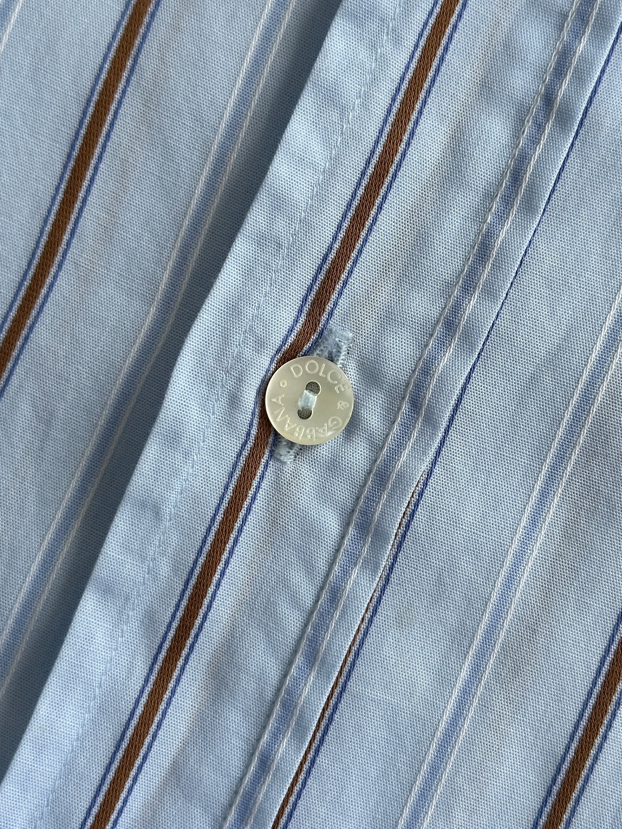 Dolce & Gabbana fitted stripe pure cotton shirt in size M/L, showcasing a classic collar and bold striped pattern.