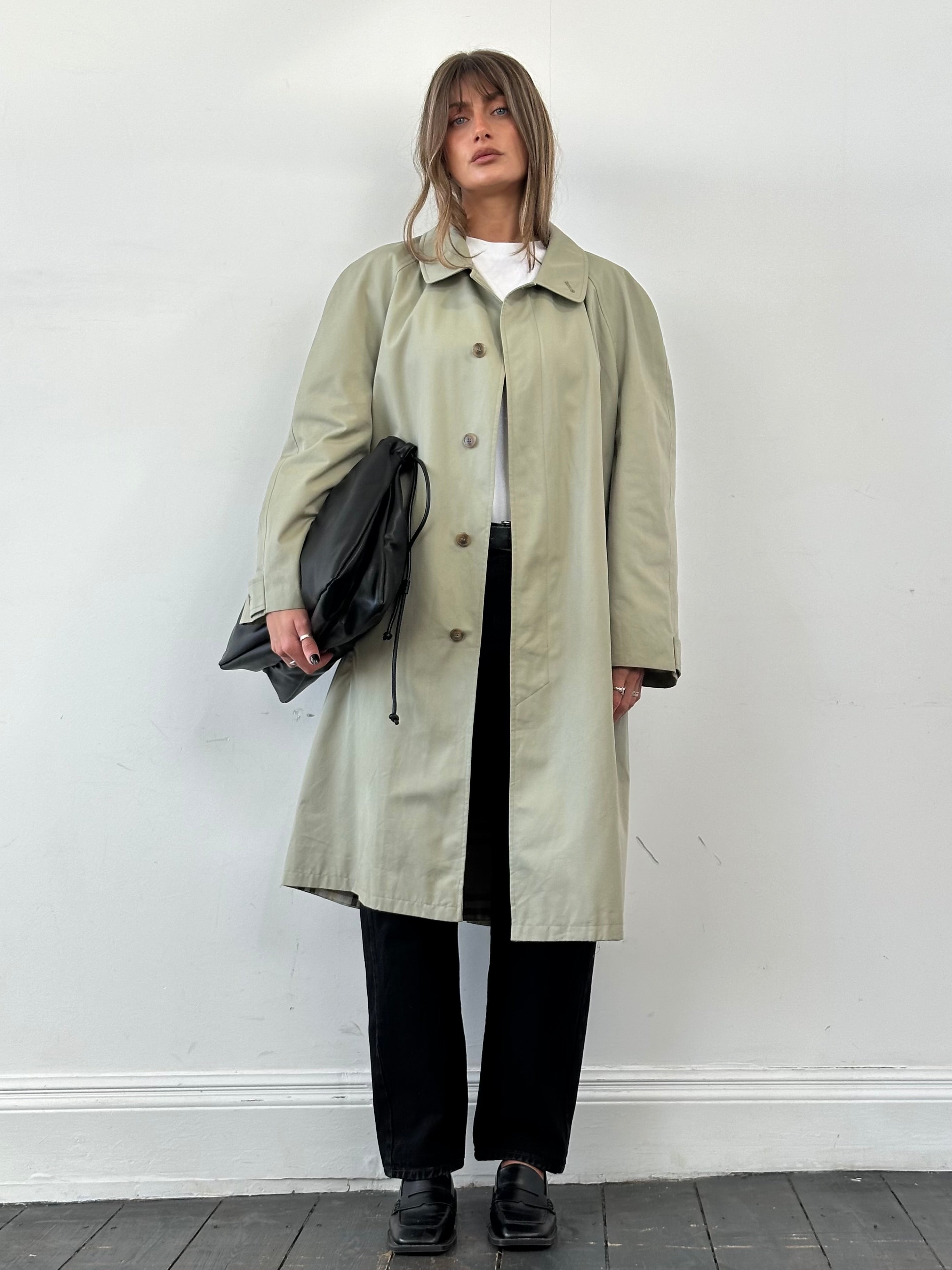 Yves Saint Laurent concealed placket trench coat in XXL, beige color, with classic collar and belted waist, stylish outerwear.