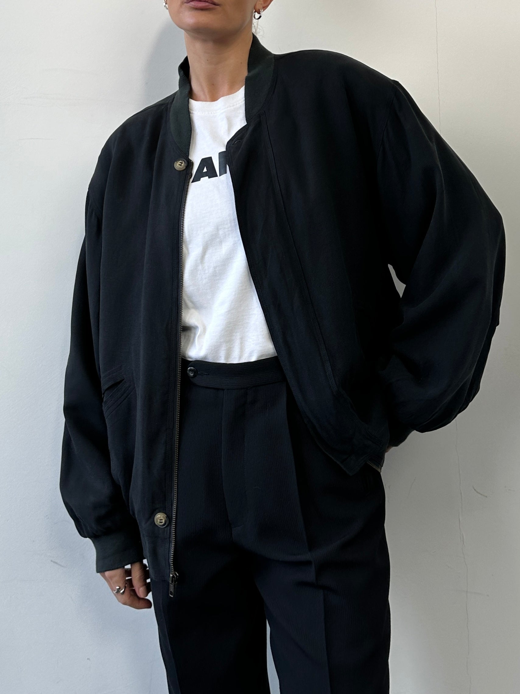 Italian vintage pure silk bomber jacket in size large with classic design and smooth silk fabric, stylish and lightweight.
