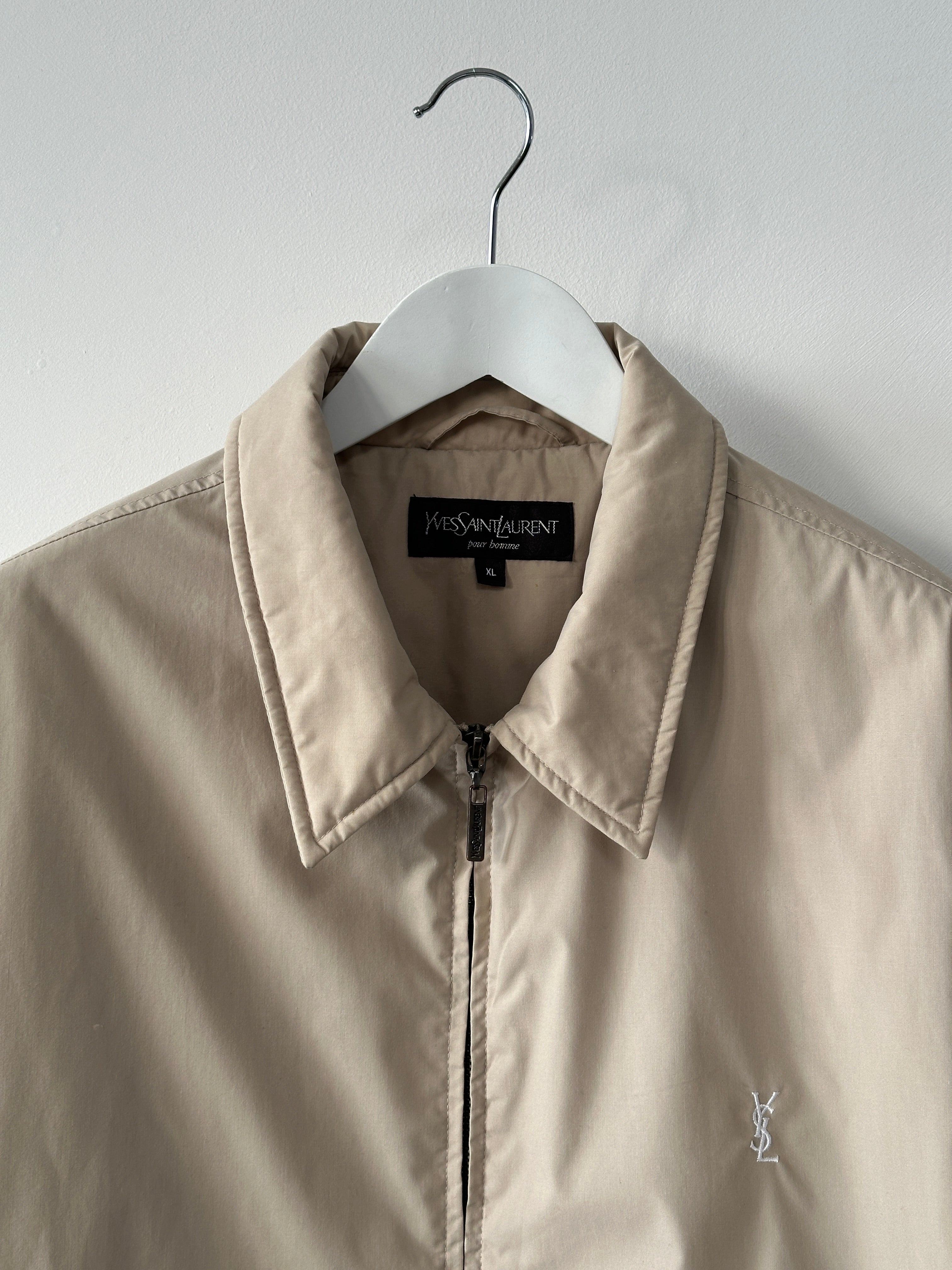 Yves Saint Laurent Pour Homme padded bomber jacket in XL with logo details, black fabric, and stylish design.