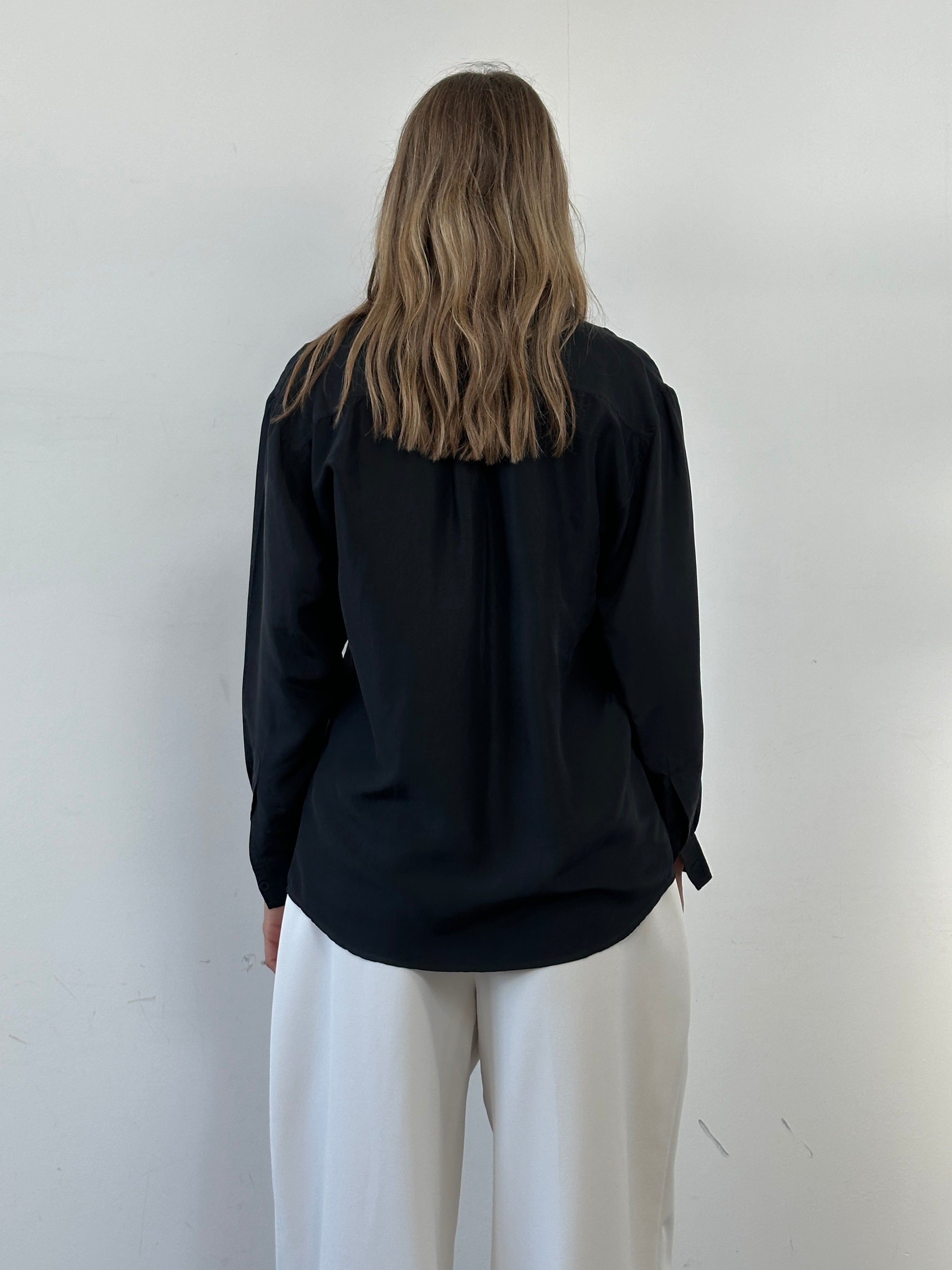 Vintage Italian pure silk shirt in size M, showcasing elegant fabric and classic design, perfect for sophisticated style.