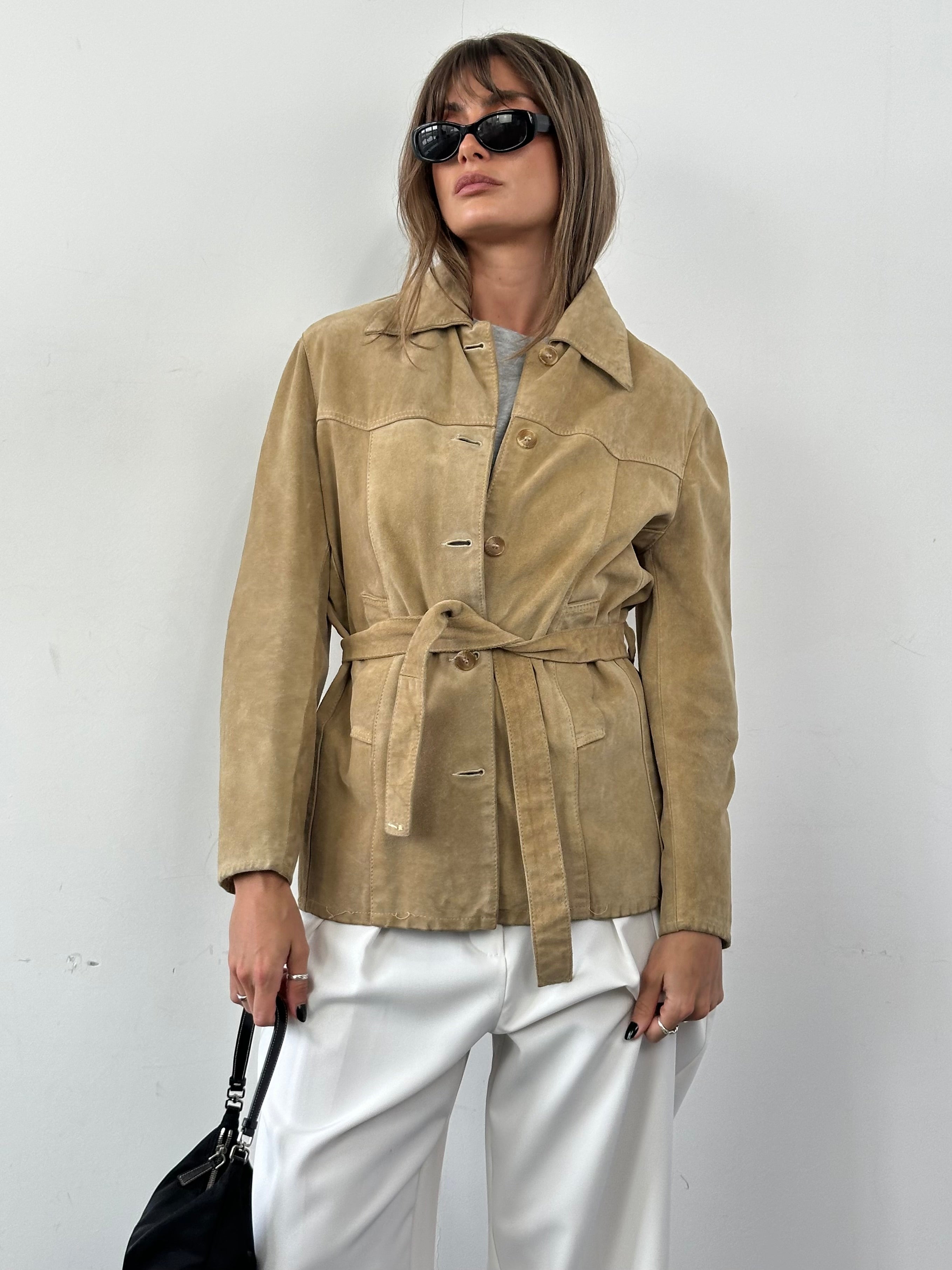 Vintage Italian vintage belted suede jacket in S/M with classic design and textured suede material.