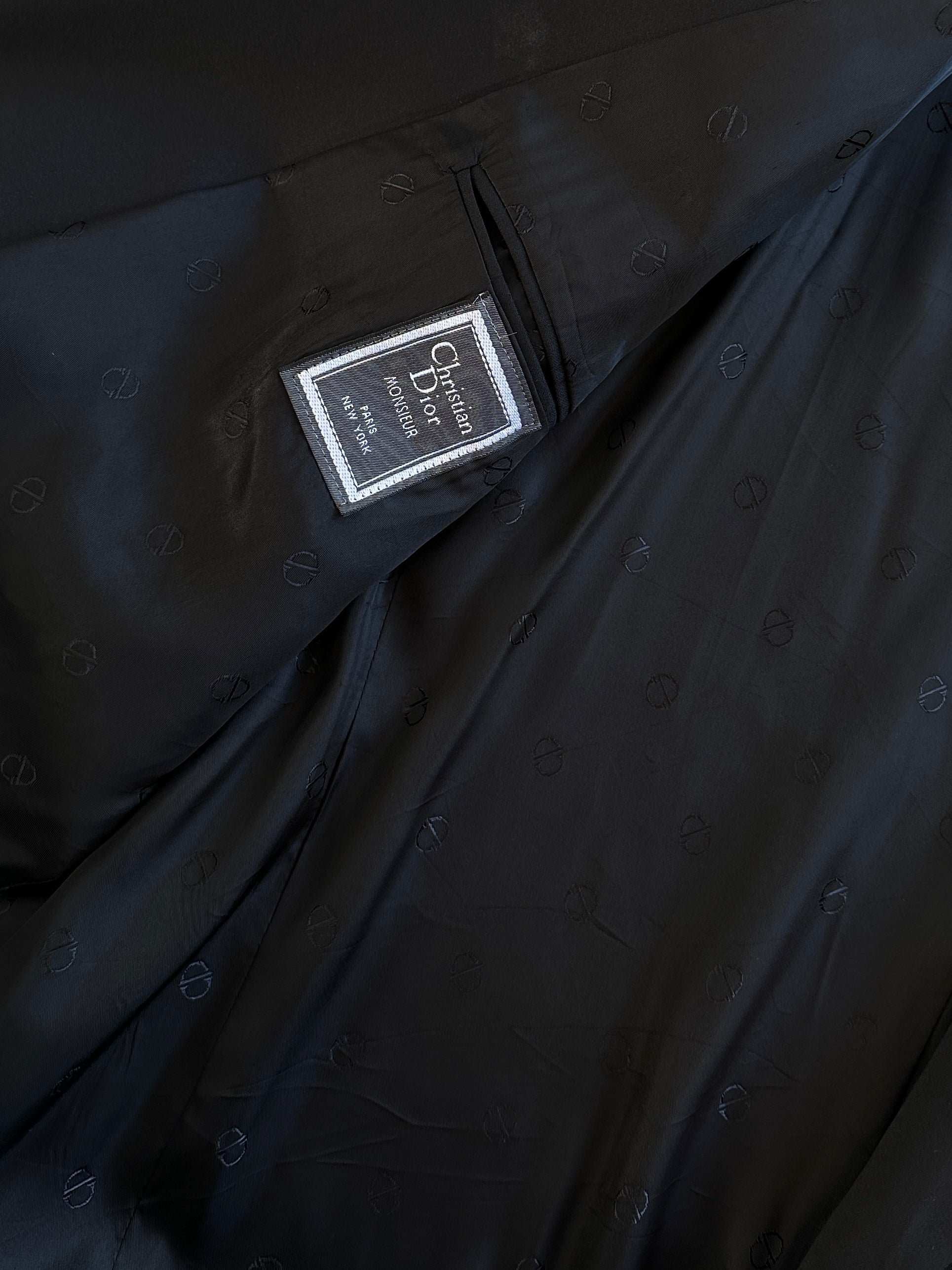 Christian Dior Monsieur 1980s wool tuxedo blazer in size 44R/XL, tailored fit with classic lapel and sleek black fabric.