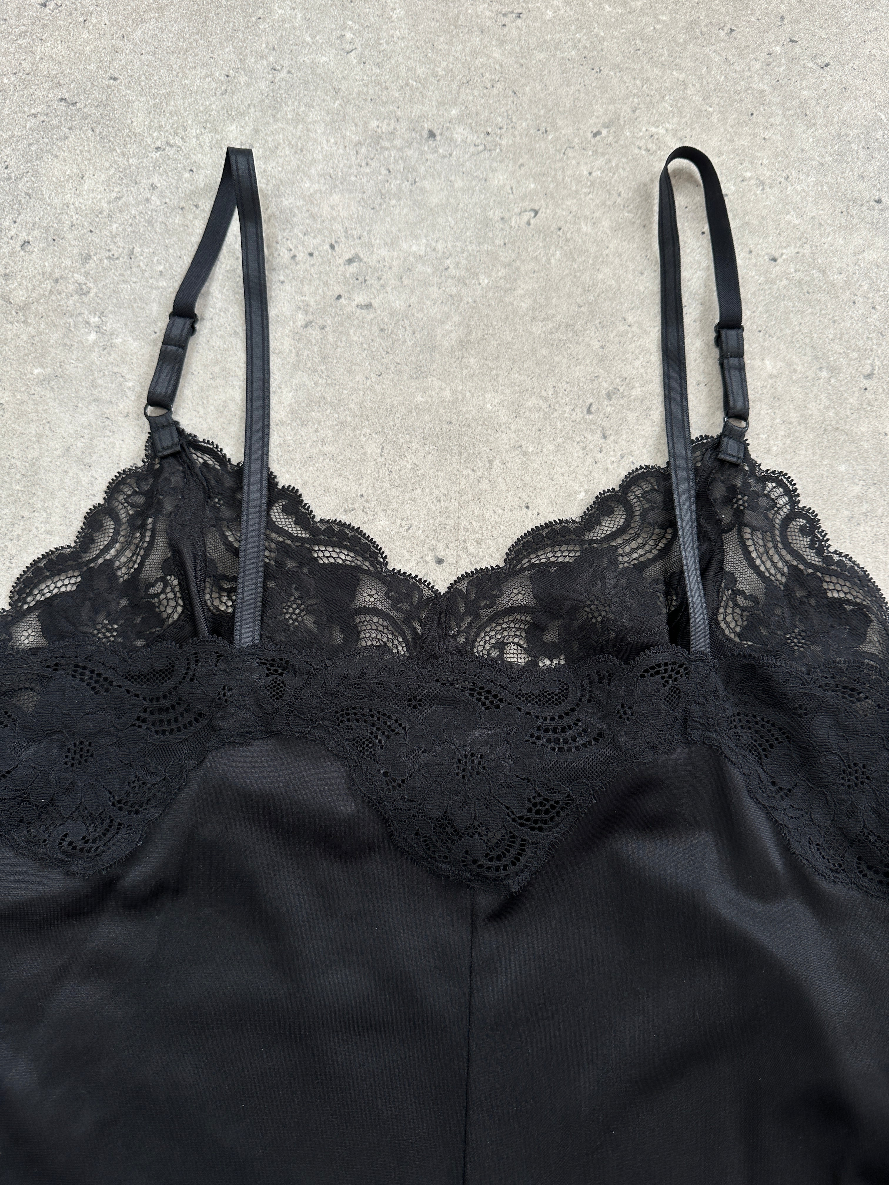 Vintage 2000s lace side split mini slip dress in size small, featuring delicate lace fabric and a flattering silhouette.