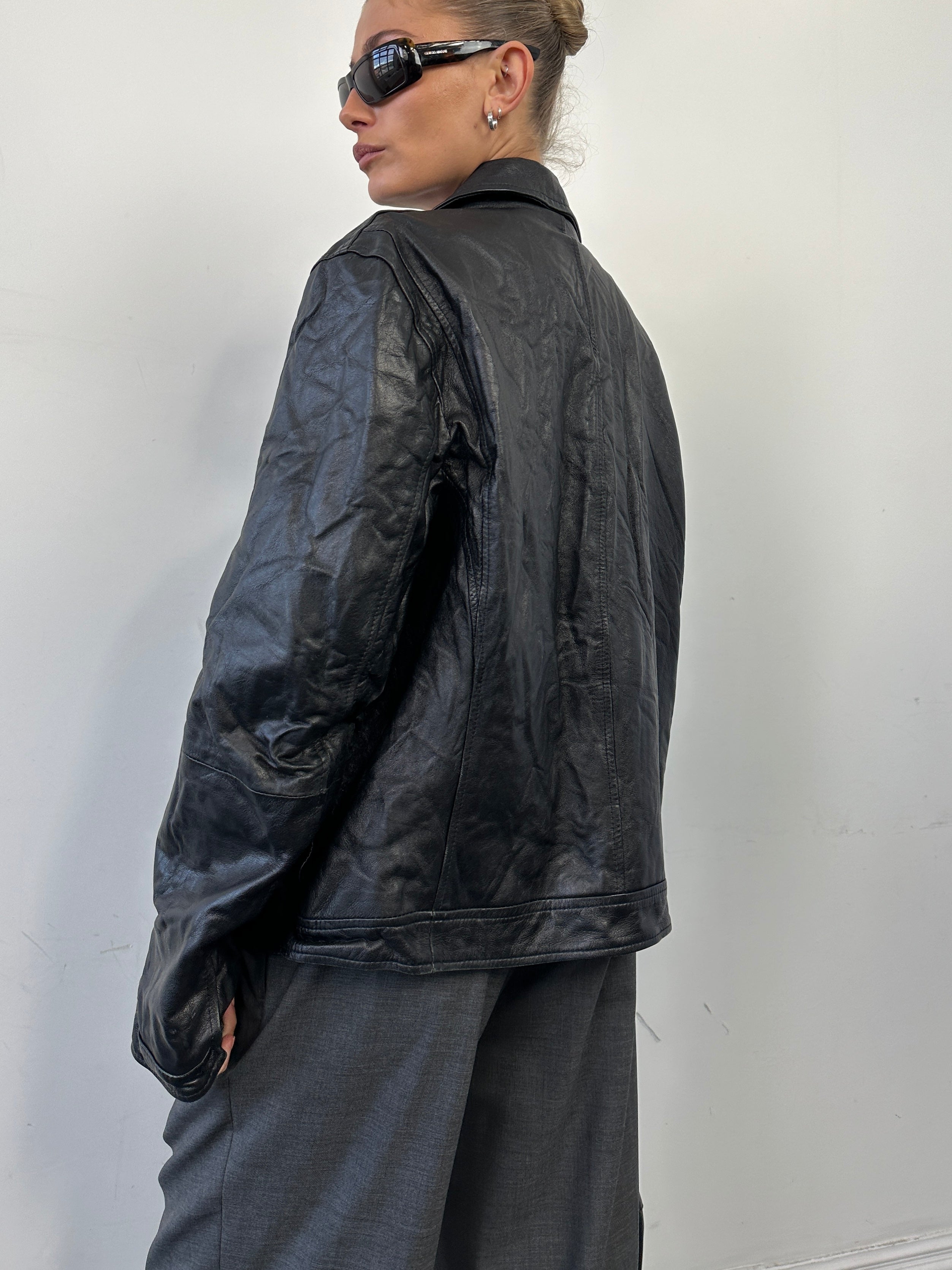 Vintage brand vintage zip-up leather jacket for men, size M, shown in dark brown with front zipper and classic design.