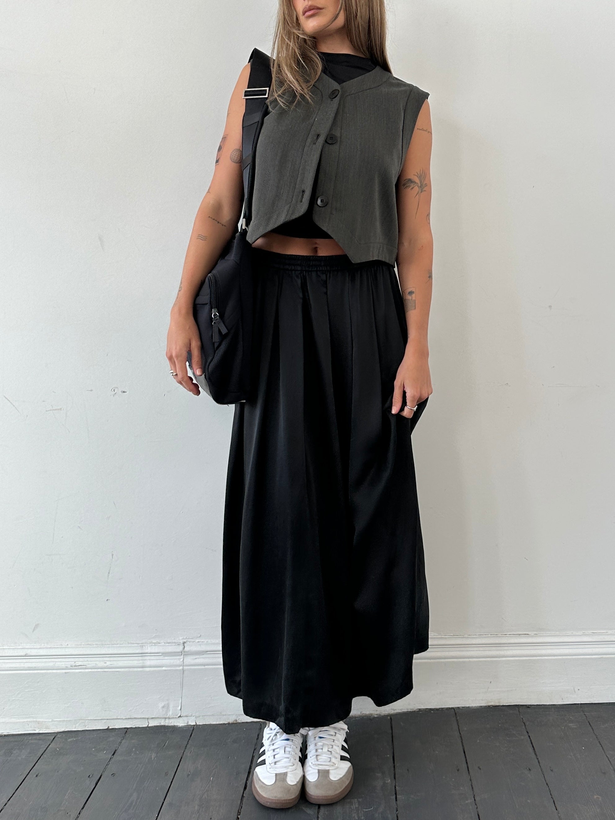 Jaeger pure silk elasticated pleated maxi skirt in W28, featuring a flowing design and soft silk fabric.