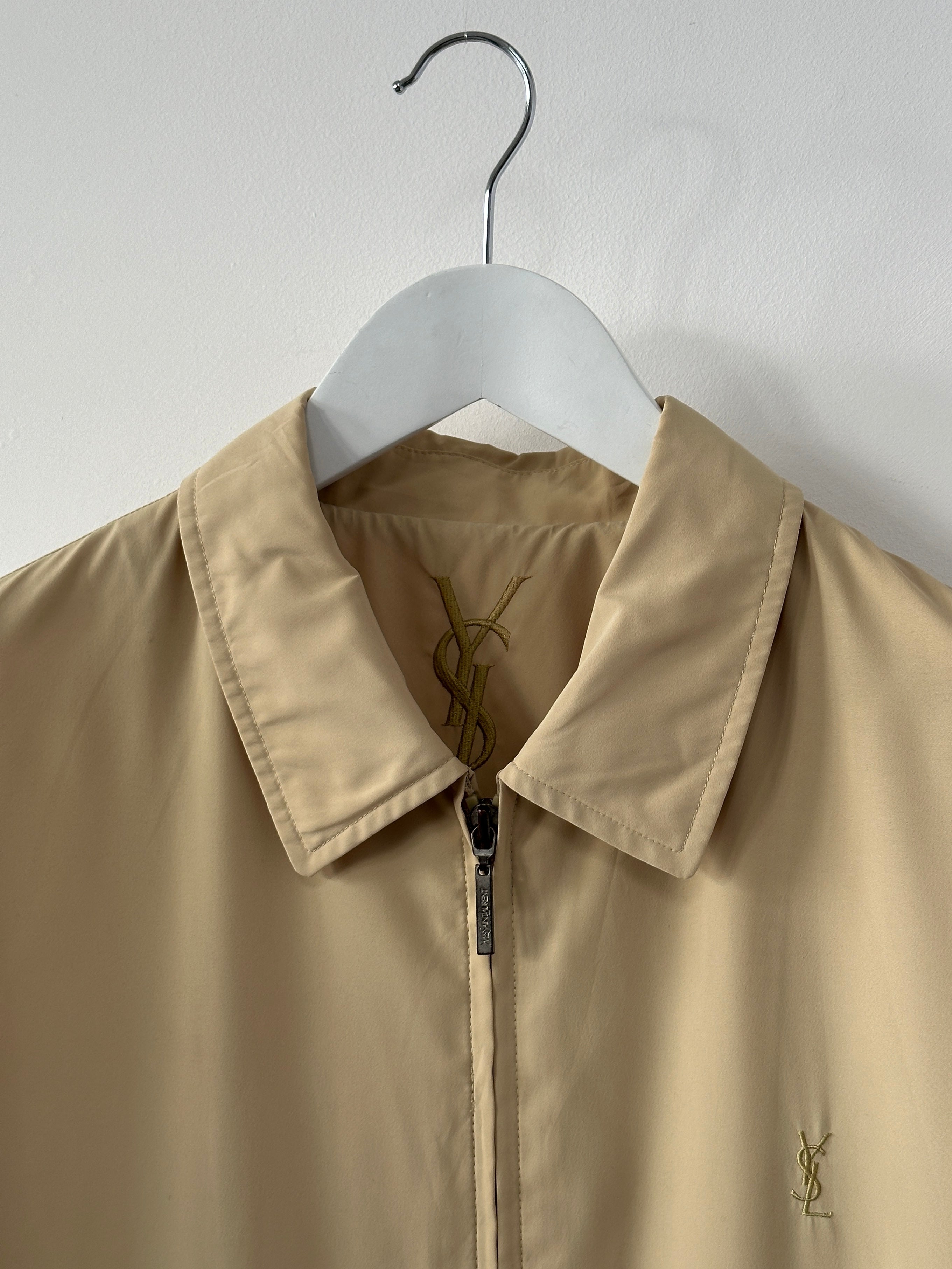 Yves Saint Laurent Pour Homme logo bomber jacket in black, front view showing the brand logo and classic bomber style.