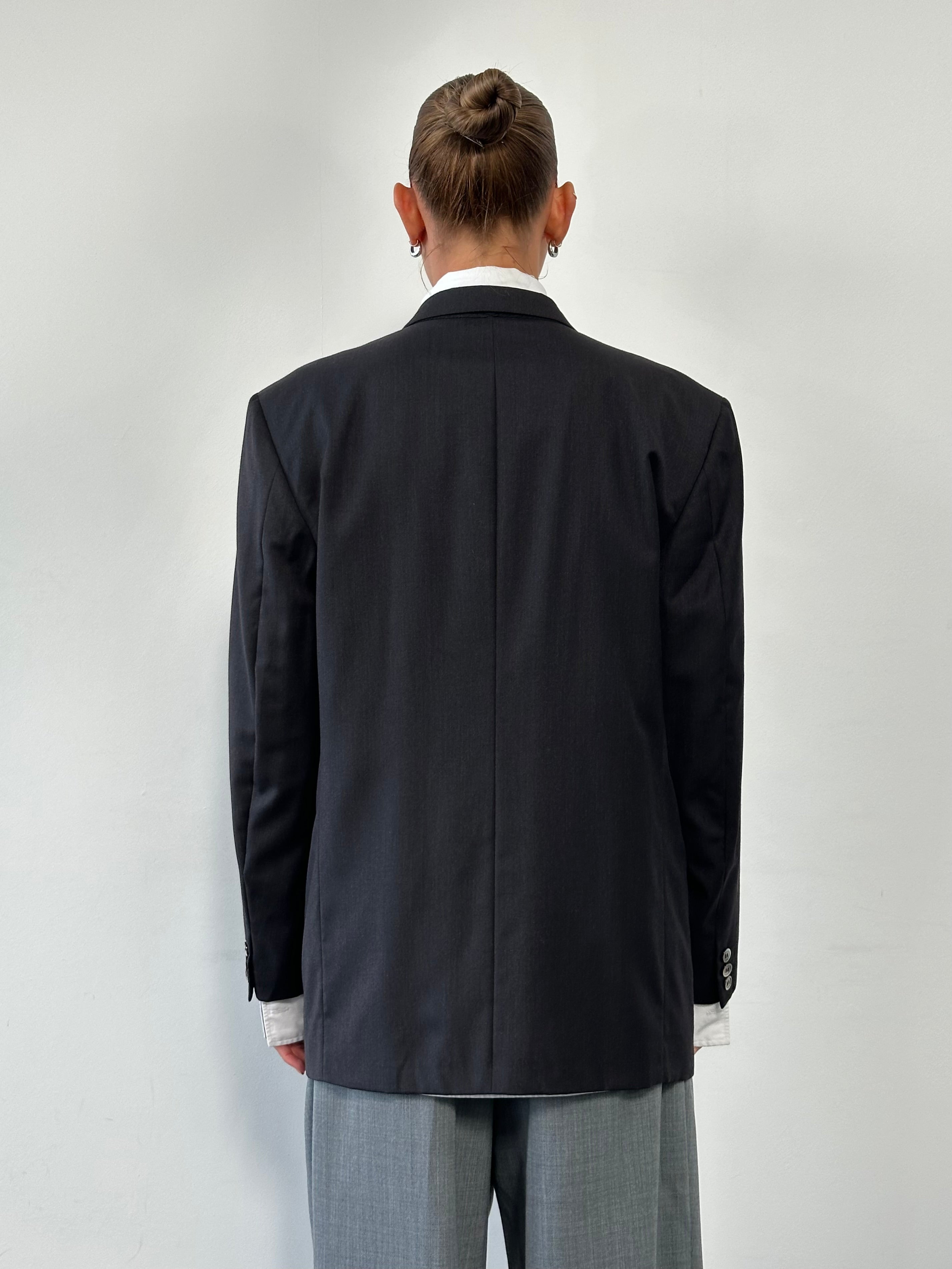 Yves Saint Laurent 80s wool double-breasted blazer in size 40R/L, featuring classic tailored design and structured fit.