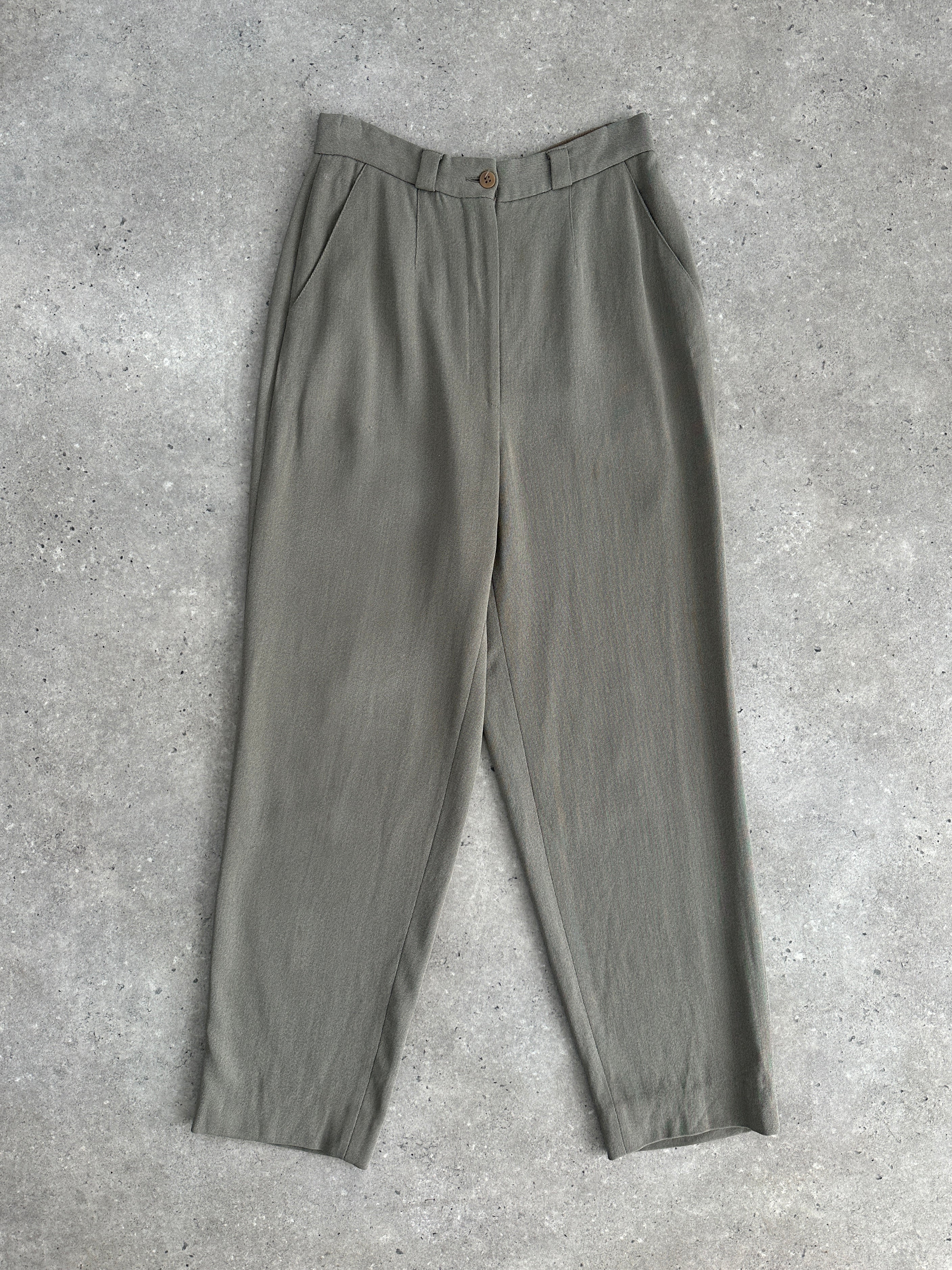 Giorgio Armani high-waisted tapered leg trousers in black, showing the tailored fit and sleek design.