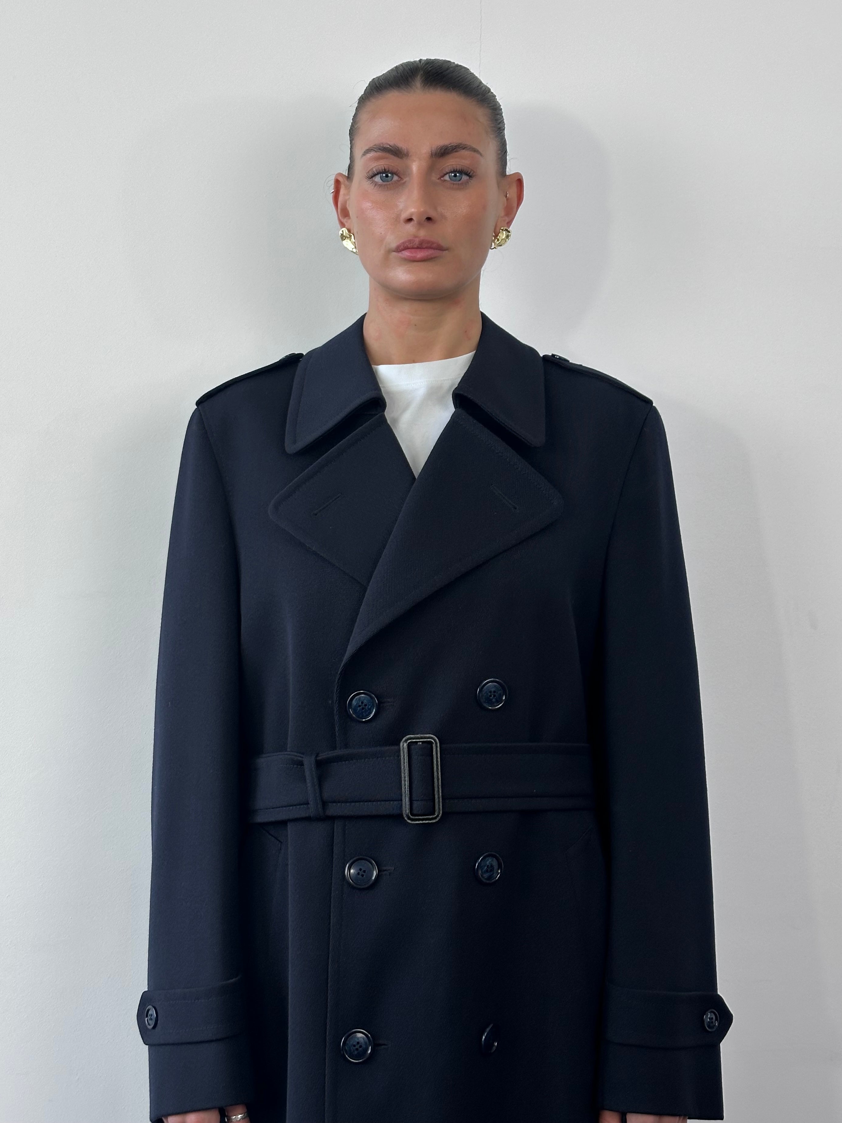 Vintage brand wool twill trench coat with belt in size XL, featuring classic design and double-breasted style.