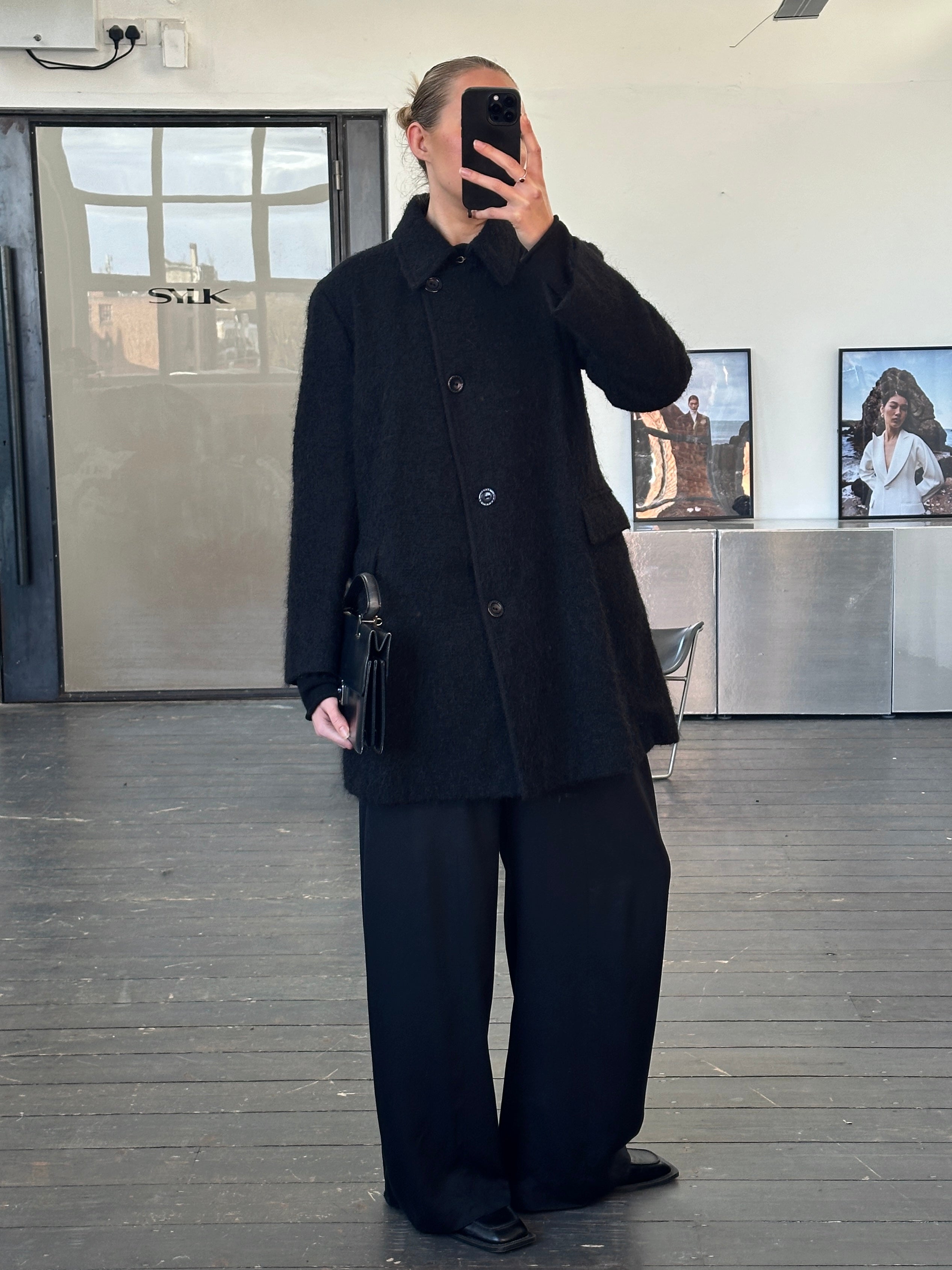 Trussardi 2000s virgin wool mohair single-breasted coat in size M displayed on a hanger.