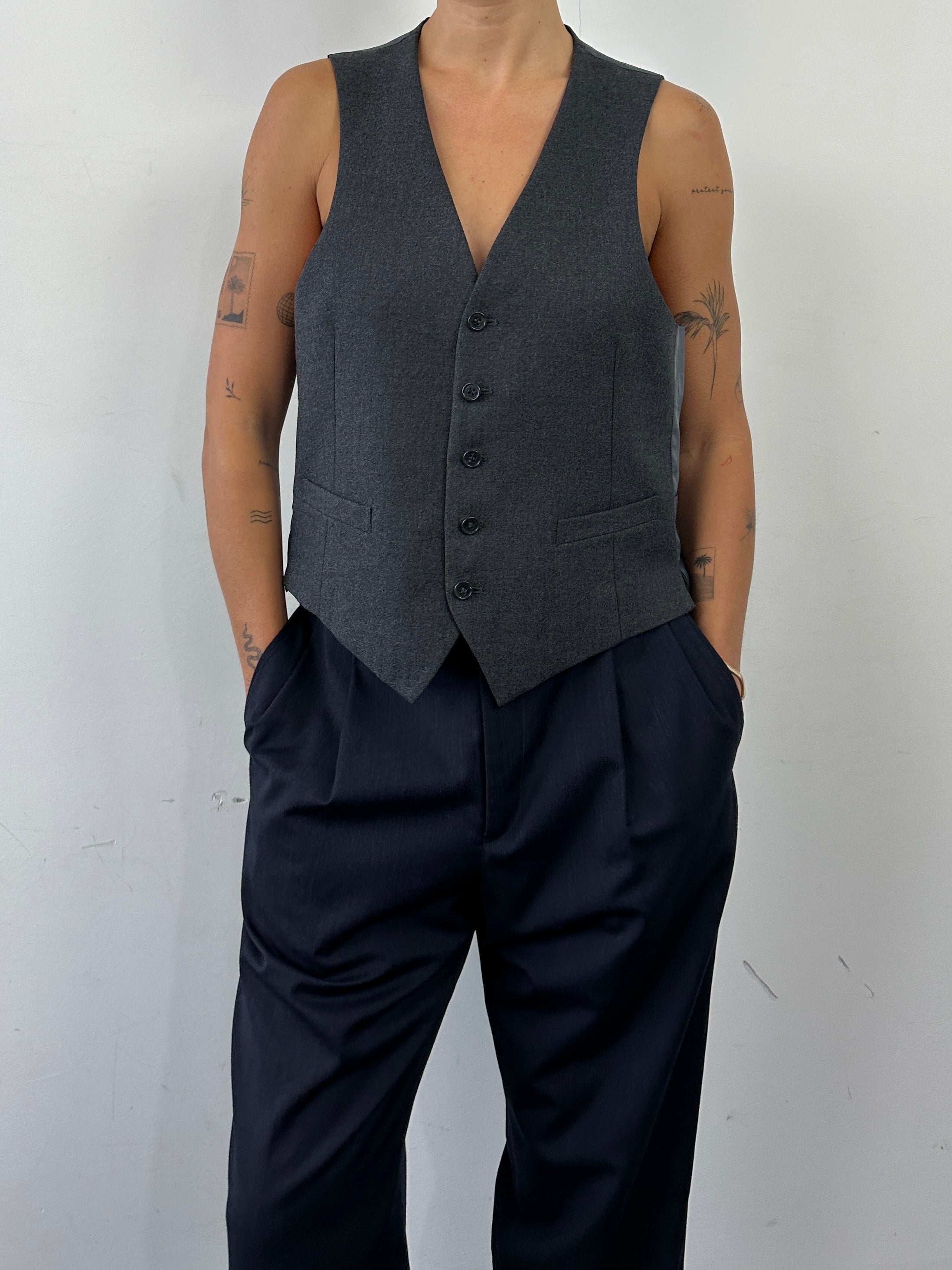 Vintage Pure Wool Single Breasted Tailored Waistcoat in size L, classic coat with structured fit and vintage style.