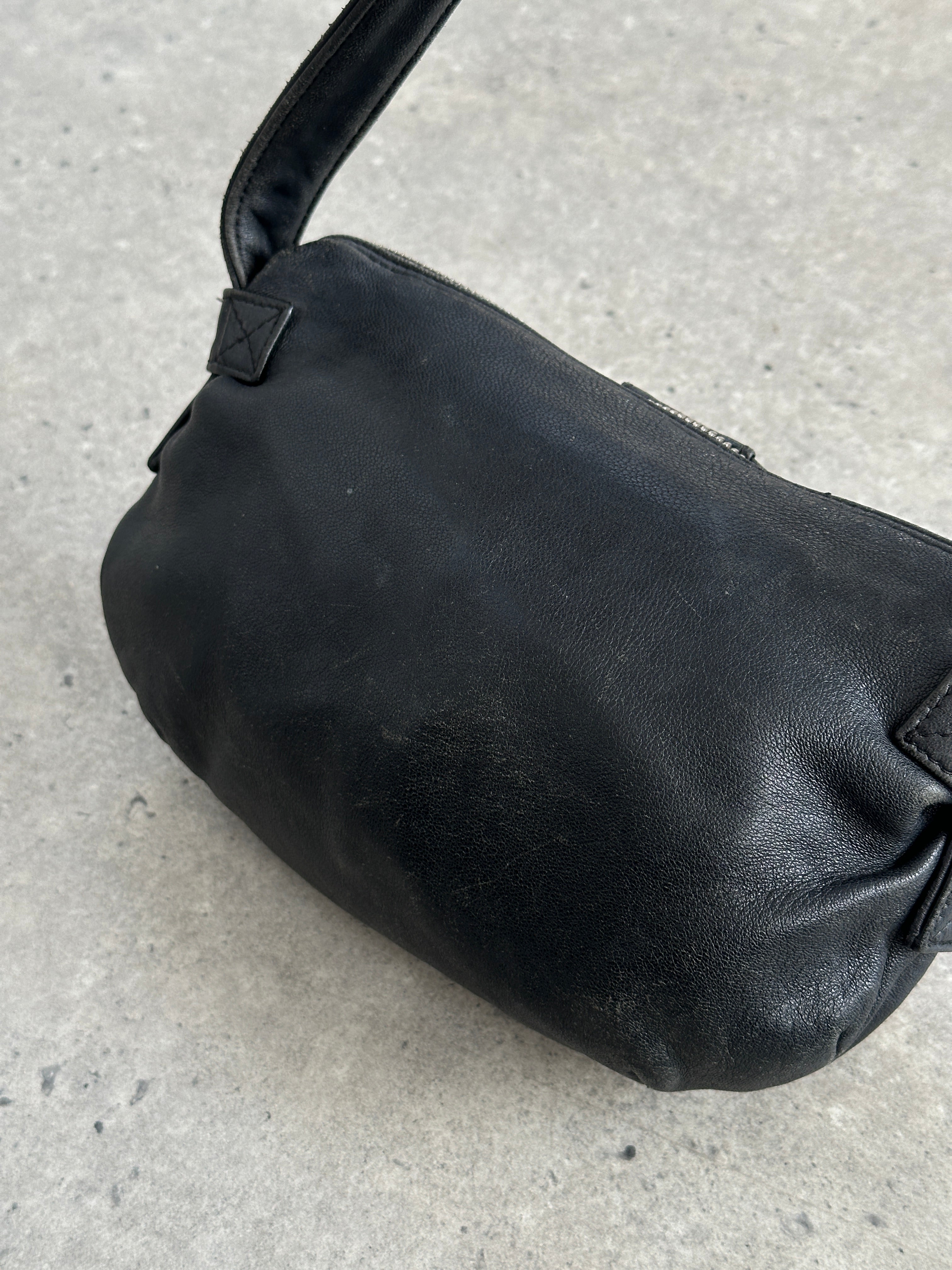 Emporio Armani 2000s aged leather shoulder bag with sleek design and subtle branding, featuring a classic, sophisticated style.