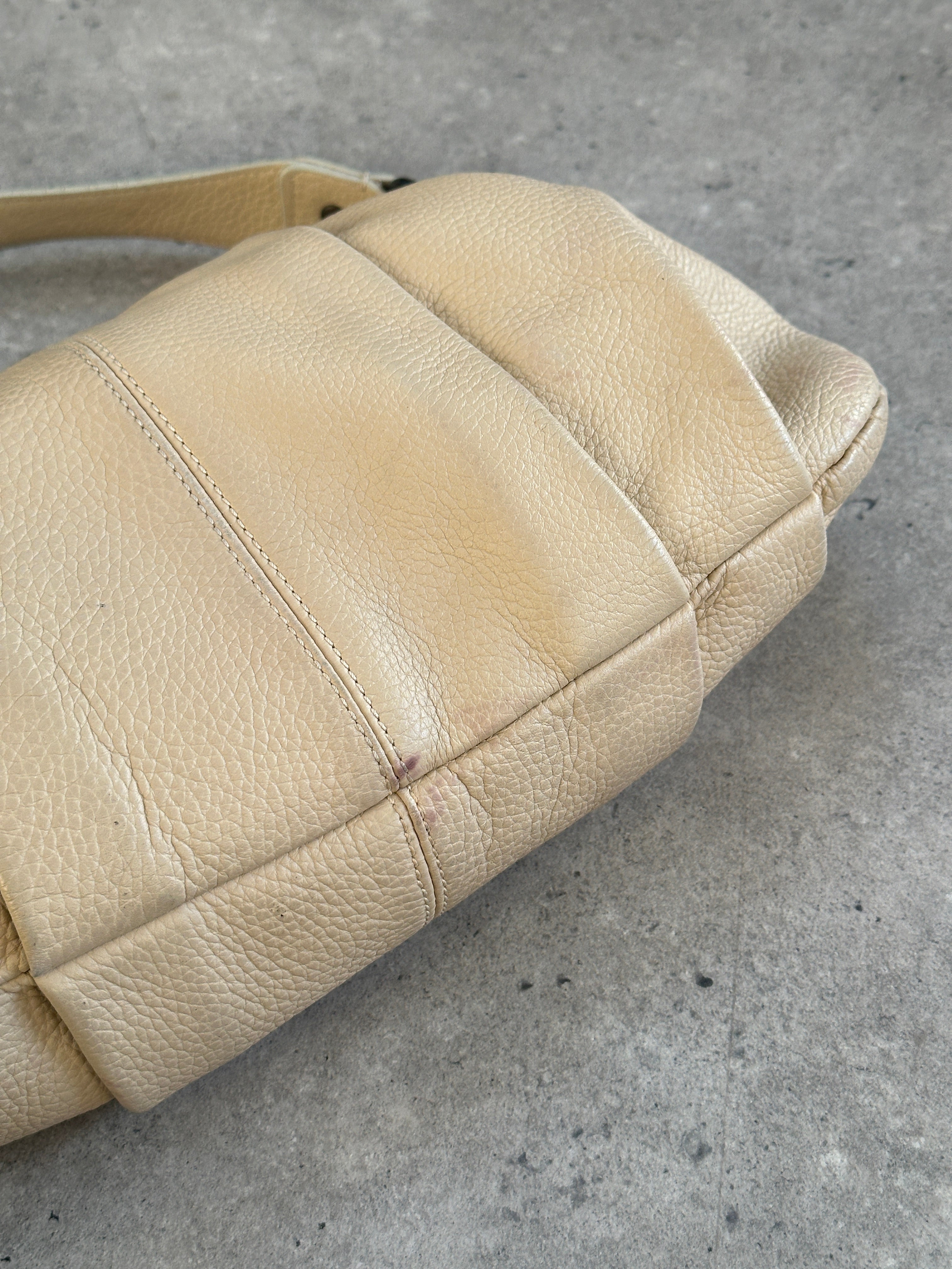 Emporio Armani leather pleated shoulder bag from the 2000s with a structured design and elegant leather finish.