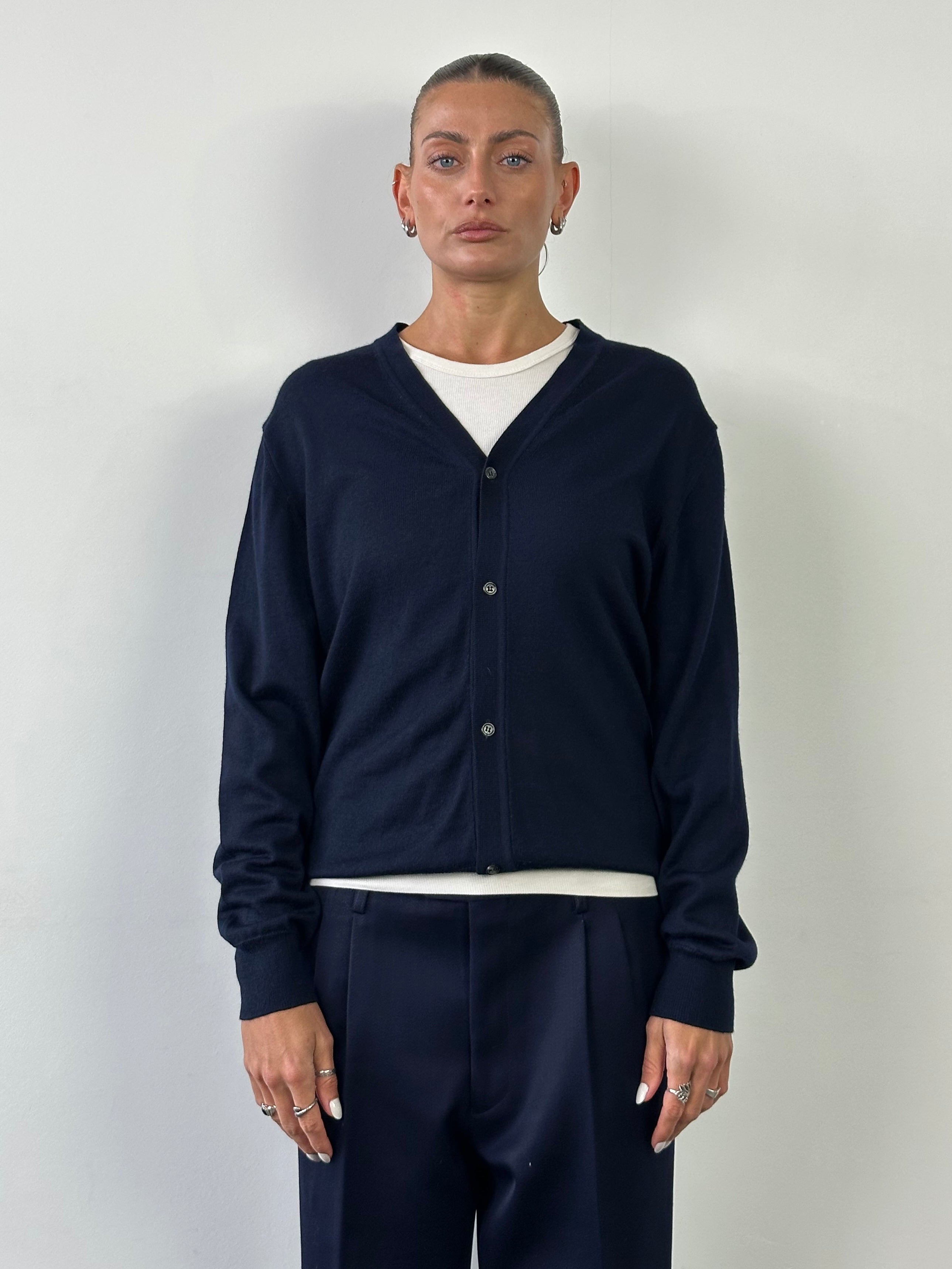 Italian Vintage Merino Wool Cardigan in size M, featuring a cozy knit design and classic style, with buttons and ribbed cuffs.