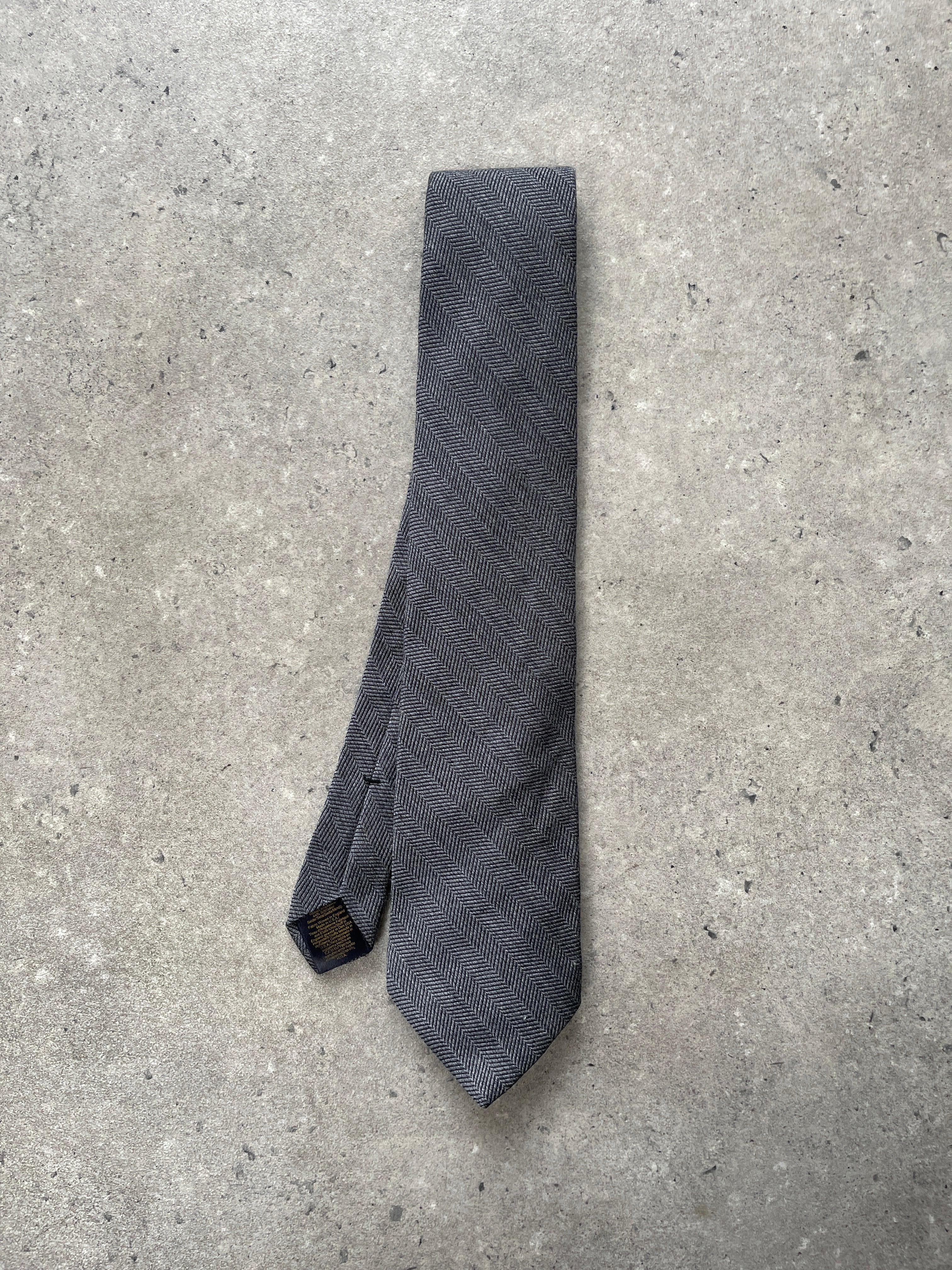 Brooks Brothers 1990s wool silk herringbone tie with classic pattern, featuring rich textures and traditional style.