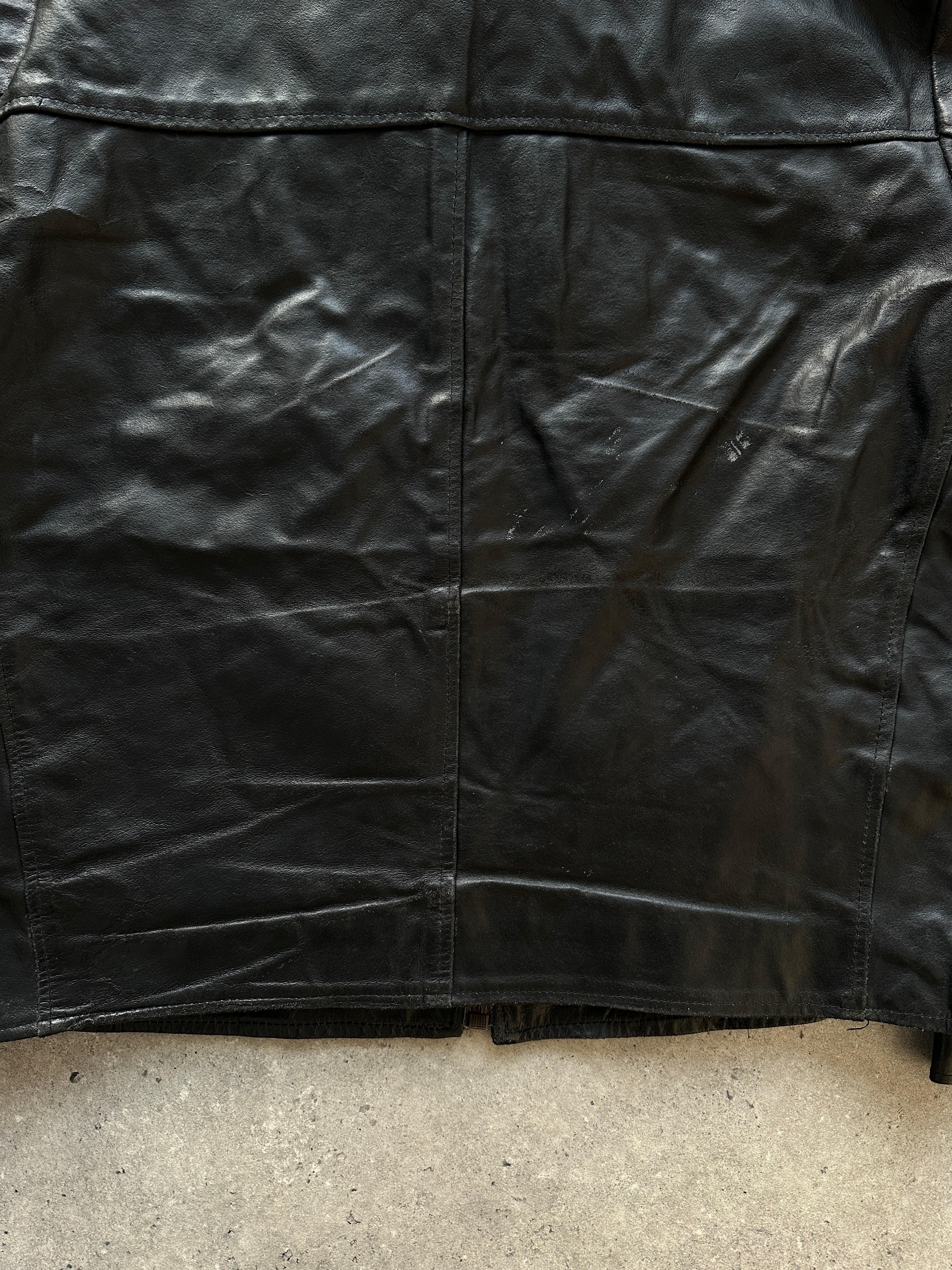 Vintage leather jacket in size large, featuring classic design with worn leather texture and stylish collar, by Vintage brand.