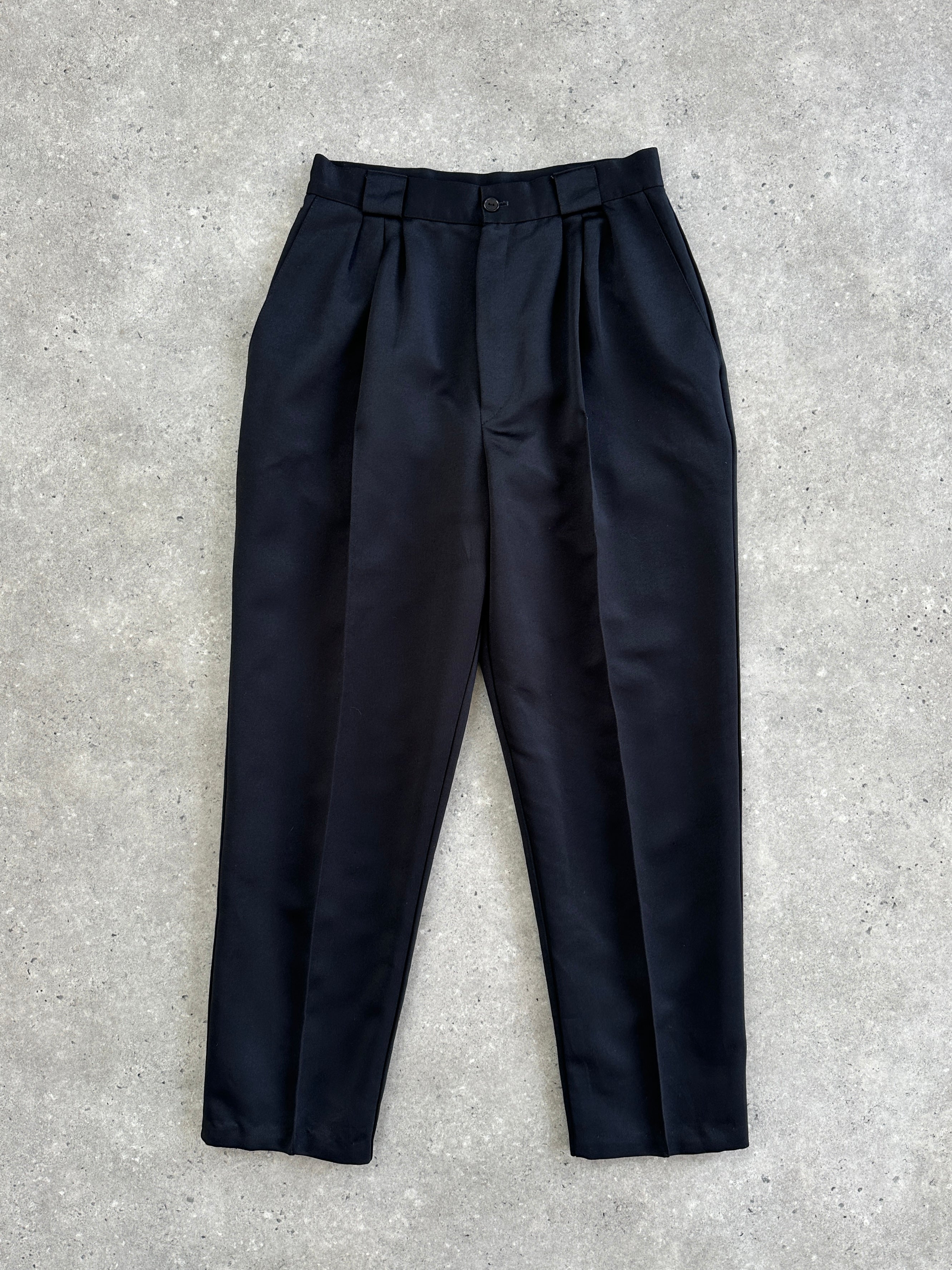 Vintage 1980s satin tapered leg high-waisted trousers in size W26, featuring a sleek, retro fit and elegant fabric.