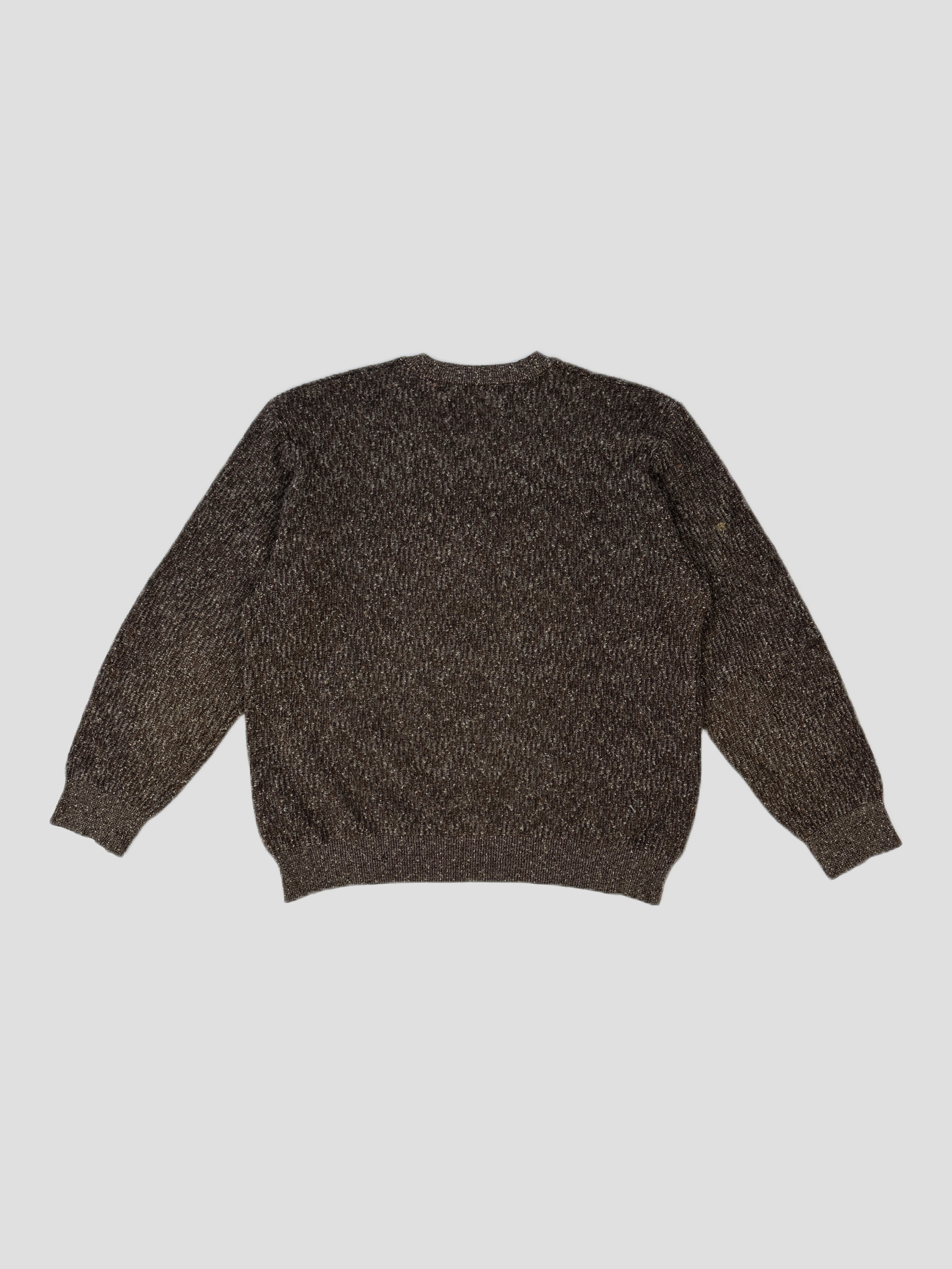 Missoni V neck wool knit jumper in size M, featuring a colorful zigzag pattern and cozy texture, casual and stylish for winter wear.