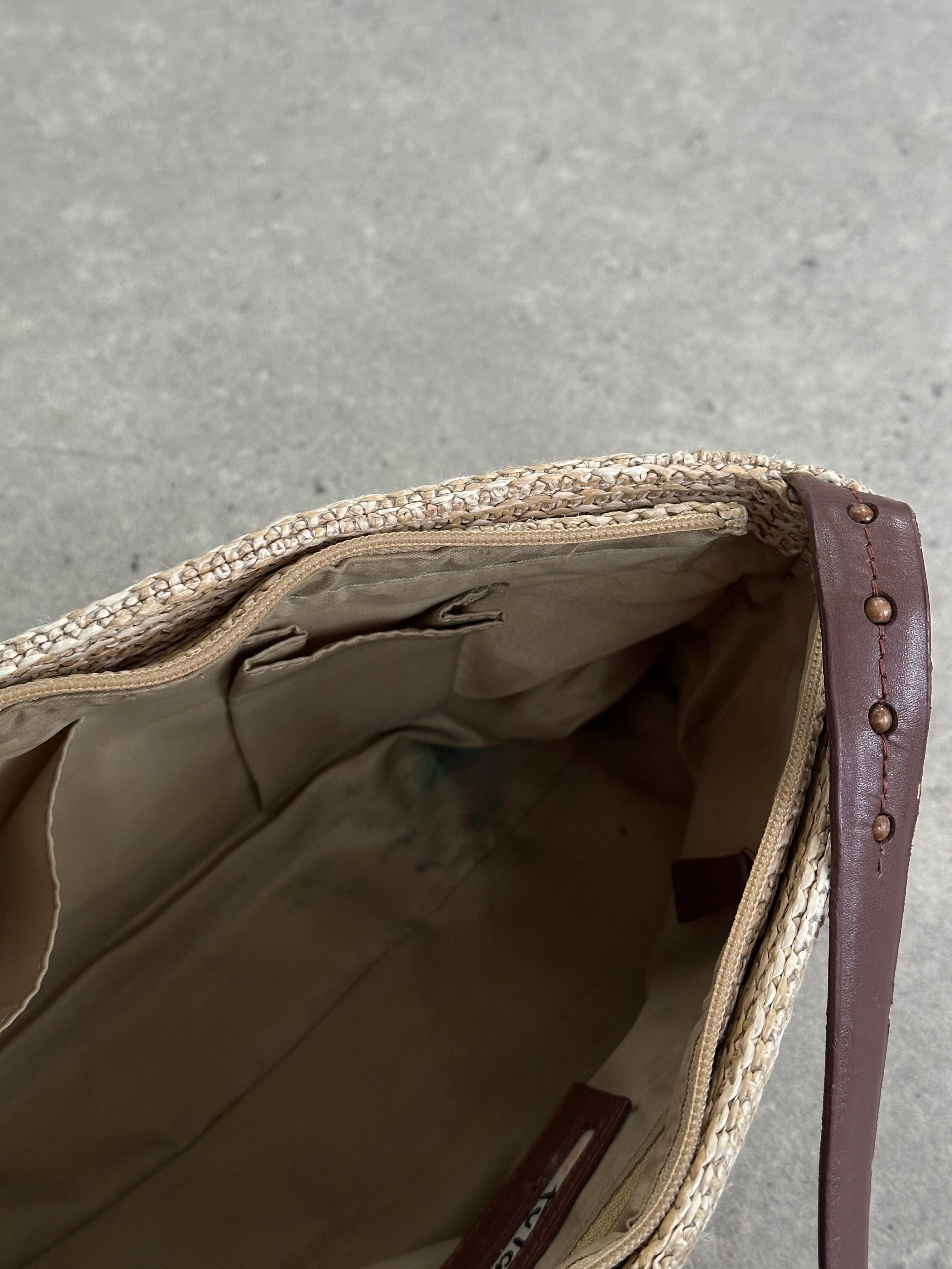 Vintage Raffia Crossbody Bag with woven texture and adjustable strap, stylish accessory for casual or summer outfits.