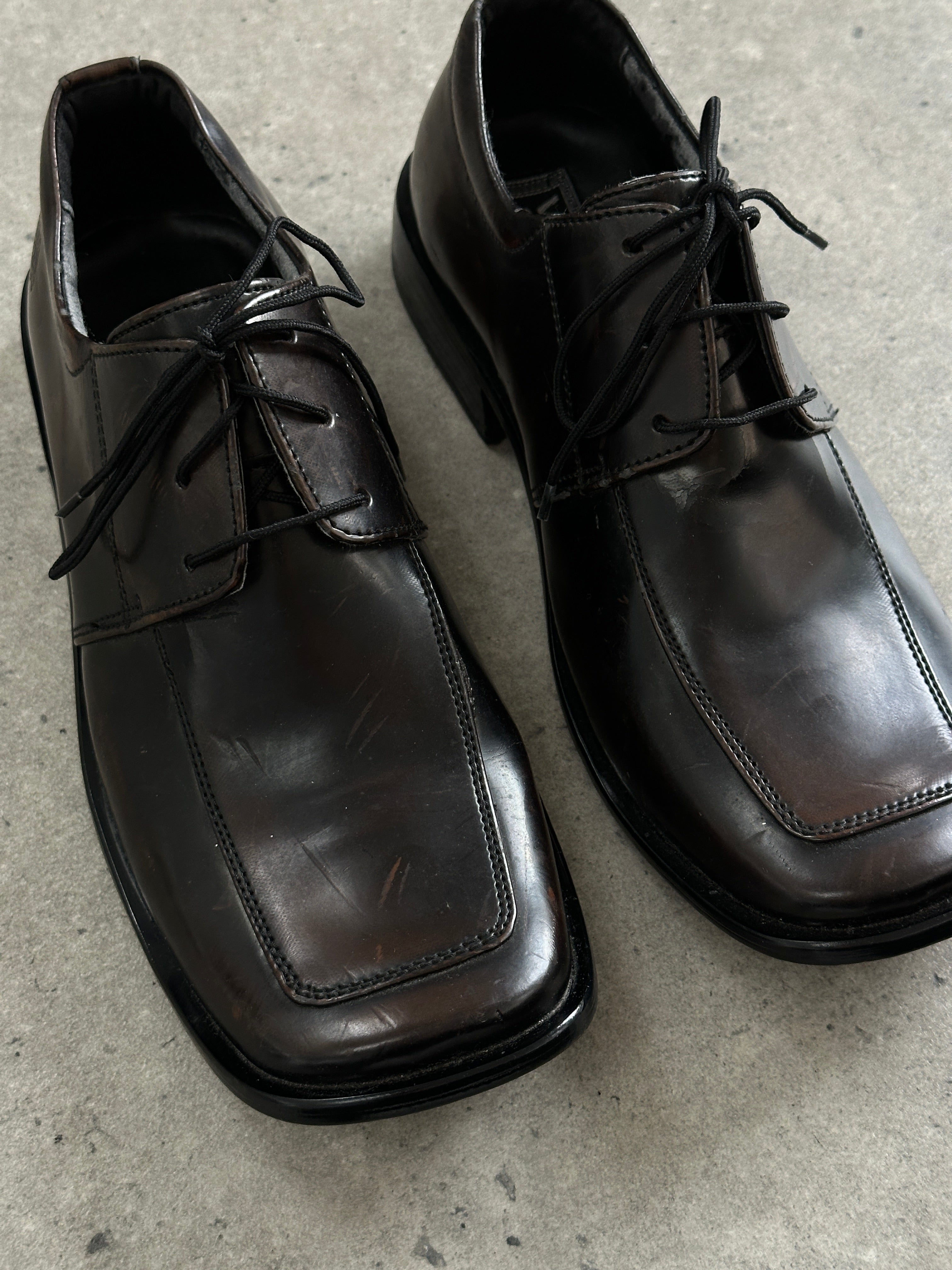 Versace Classic V2 leather square toe loafers in UK 7, showcasing sleek black design and polished finish.