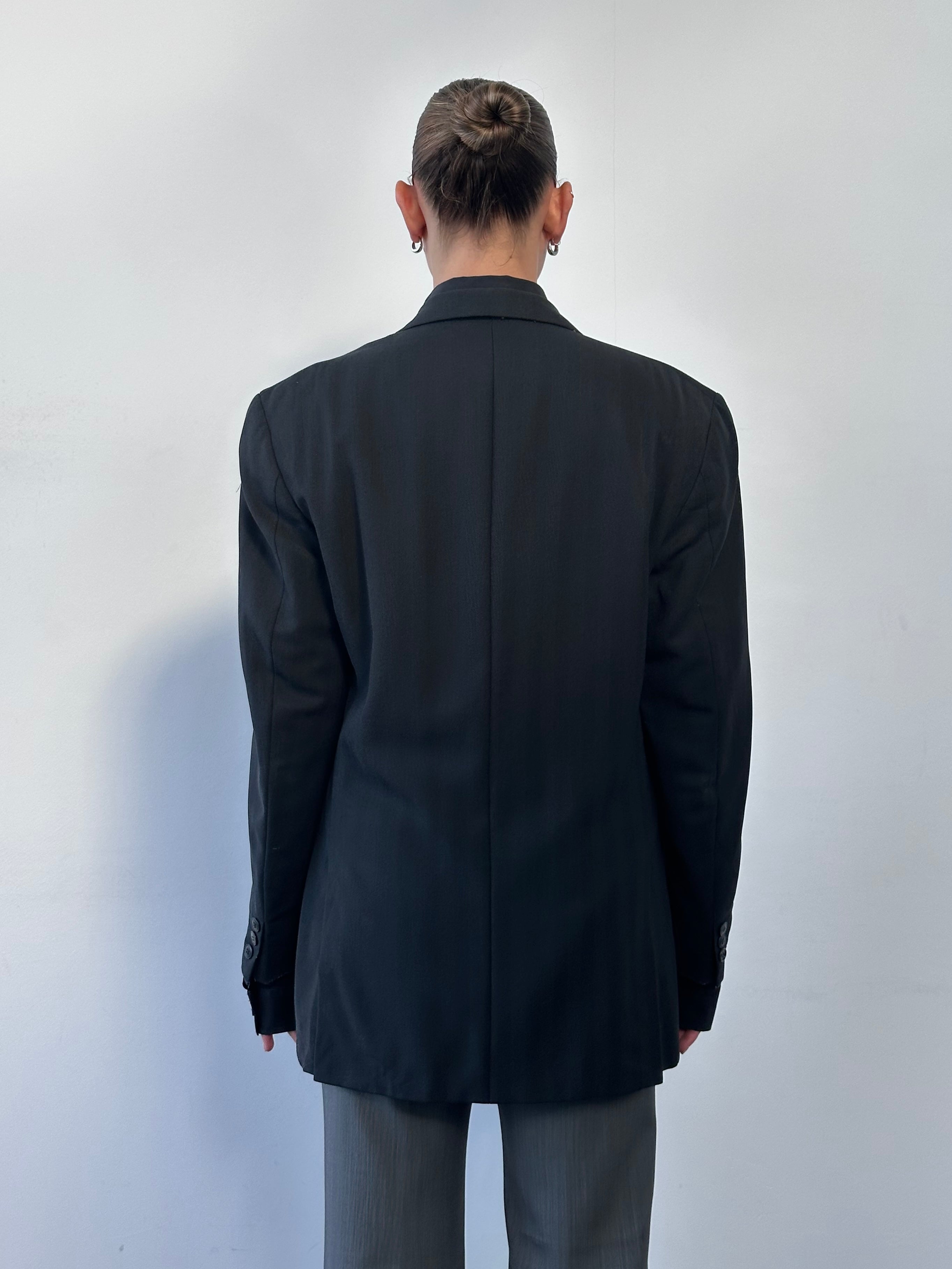 Yves Saint Laurent Pour Homme 1990s wool single-breasted blazer in size 40R/L, dark tailored design with notch lapels.