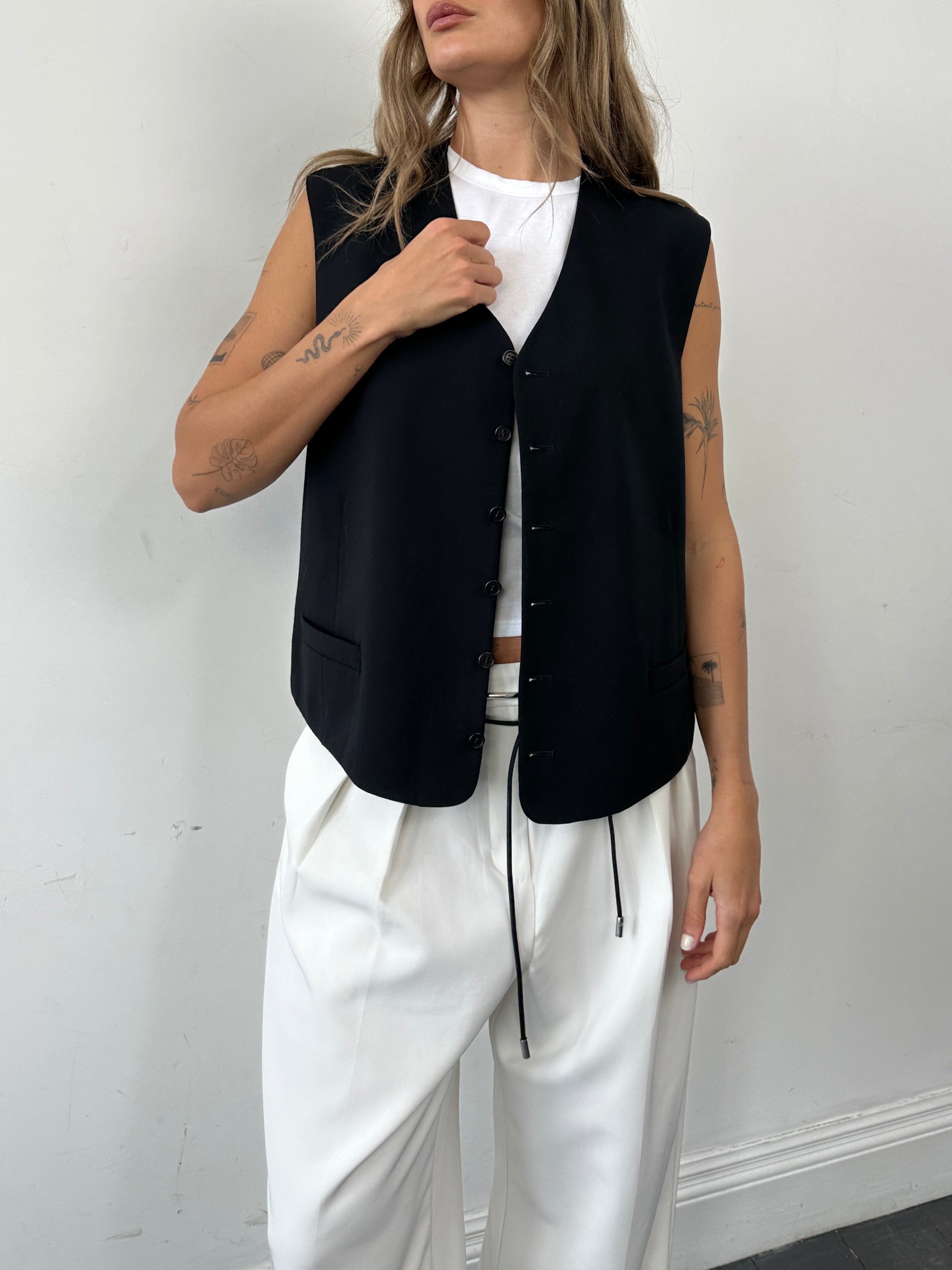 Yves Saint Laurent pure wool tailored waistcoat in size 46R/XL, beige color, featuring a classic fit and lapel collar.