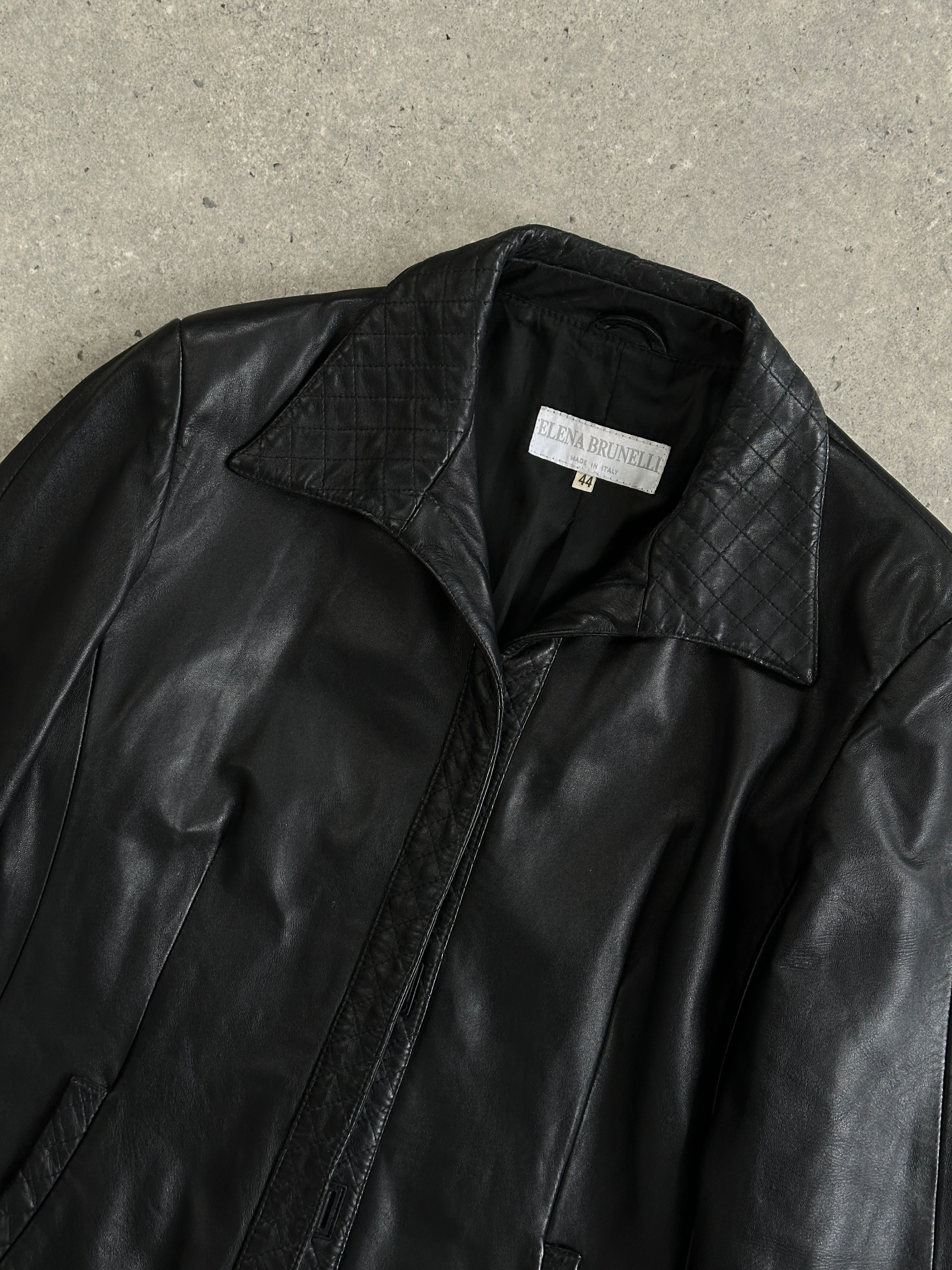 Vintage Italian leather jacket in size S, featuring classic design and rich brown leather with detailed stitching.