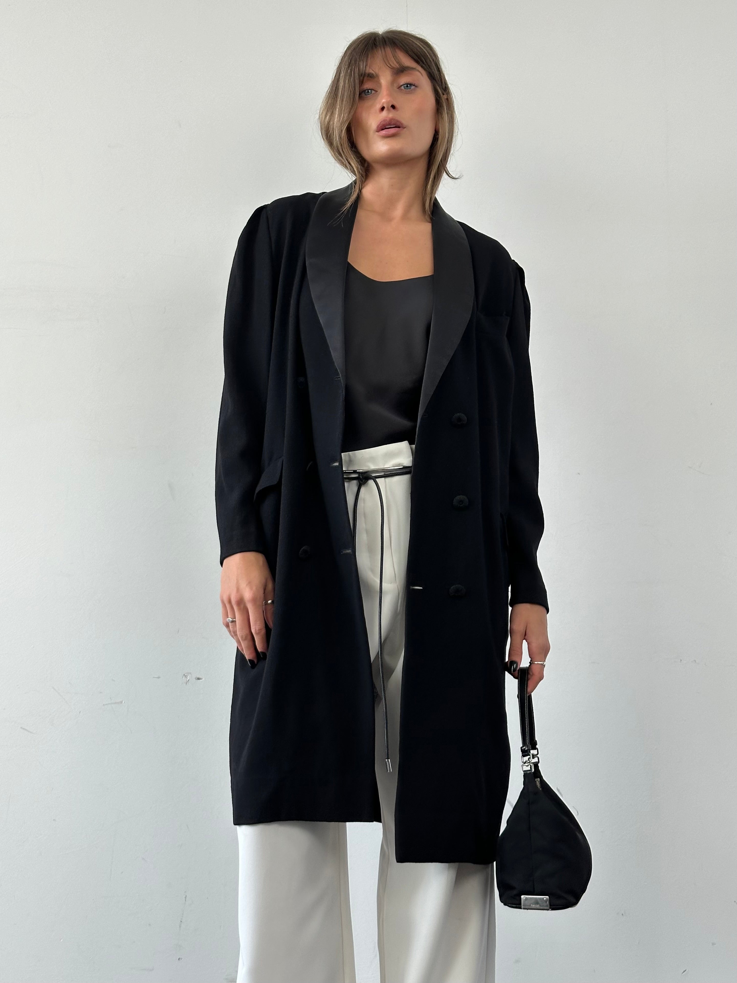 Jaeger lightweight double-breasted wool tuxedo coat in black, tailored fit, with classic lapels and button details.