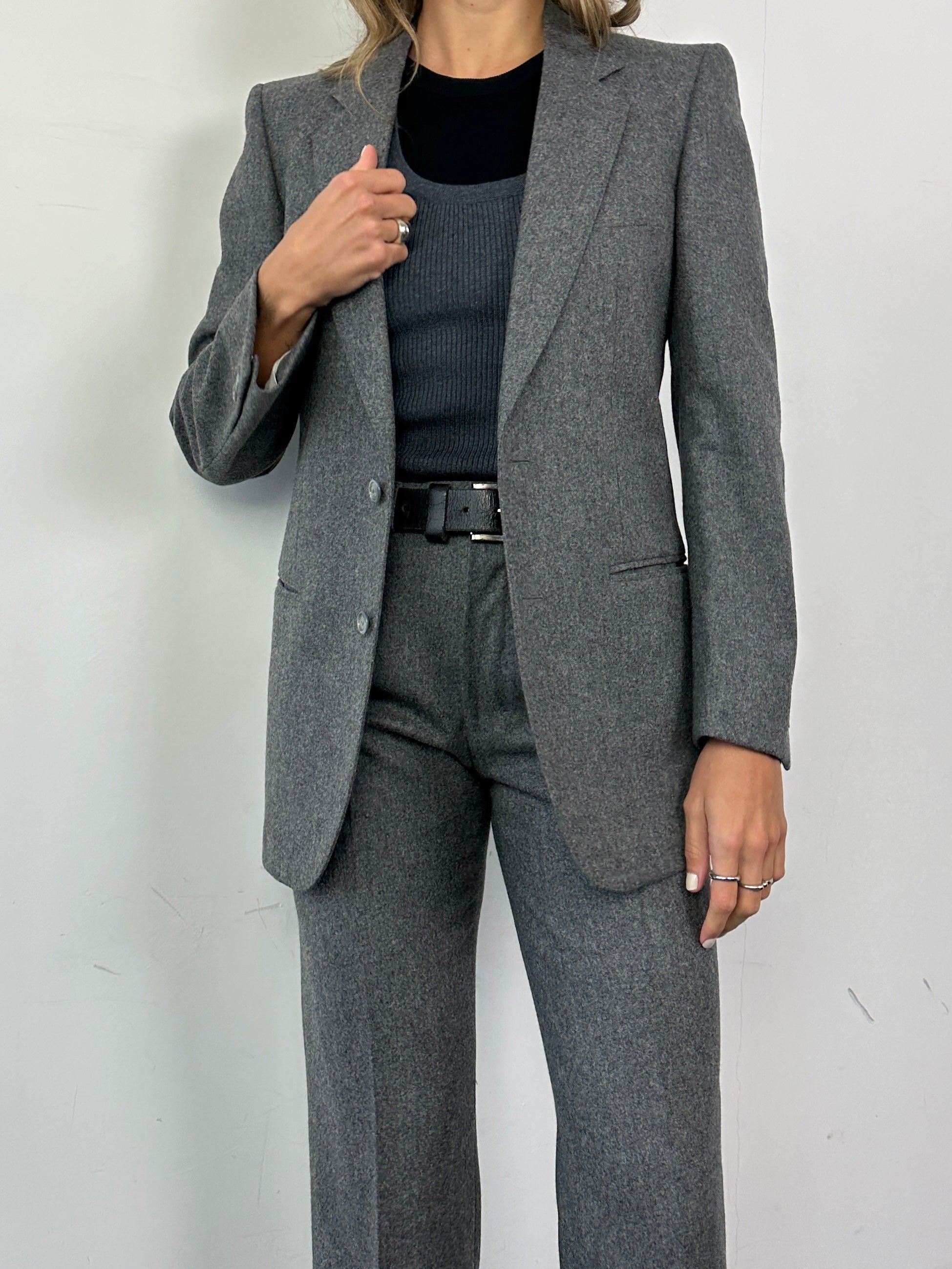 Vintage Italian vintage pure wool single-breasted suit jumpsuit in size XS/W27, featuring classic tailored design and elegant fabric.