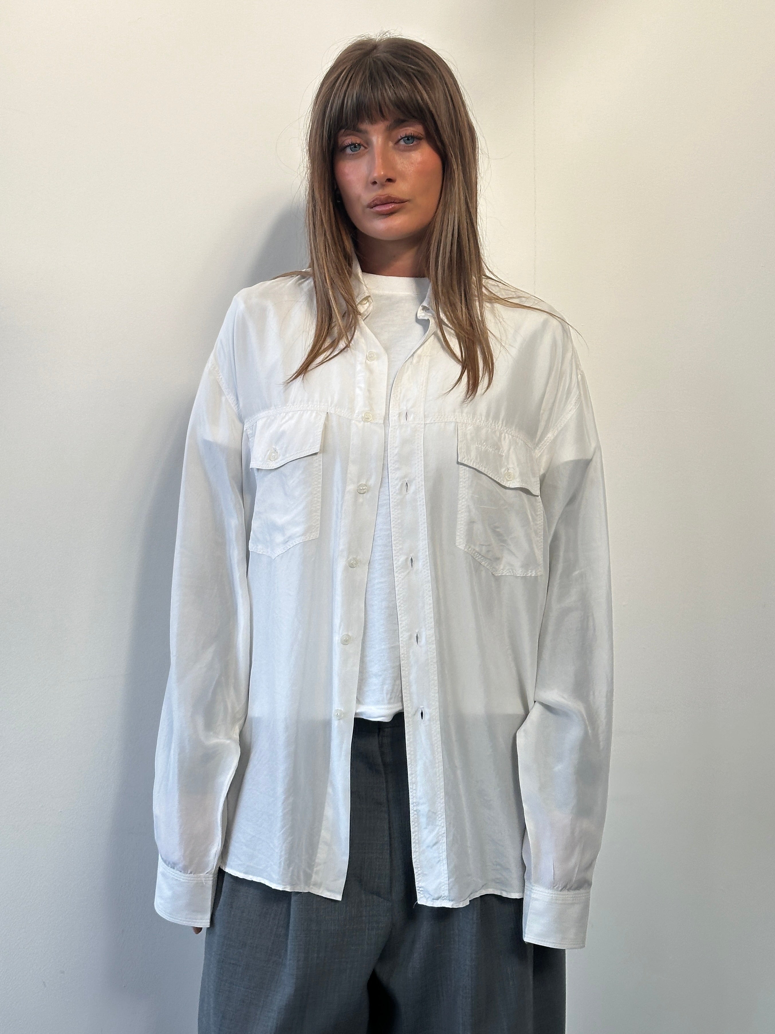 Vintage 1990s pure silk shirt in size XL, featuring a classic design and smooth fabric, perfect for vintage fashion enthusiasts.