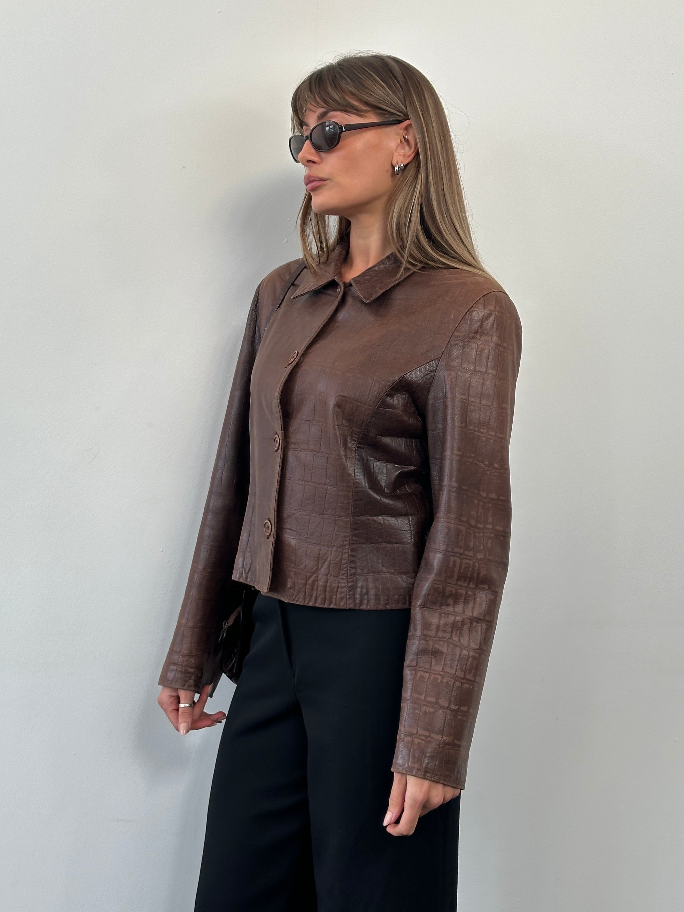 Emporio Armani 1990s leather jacket in size S/M, stylish black leather with classic design and subtle branding details.