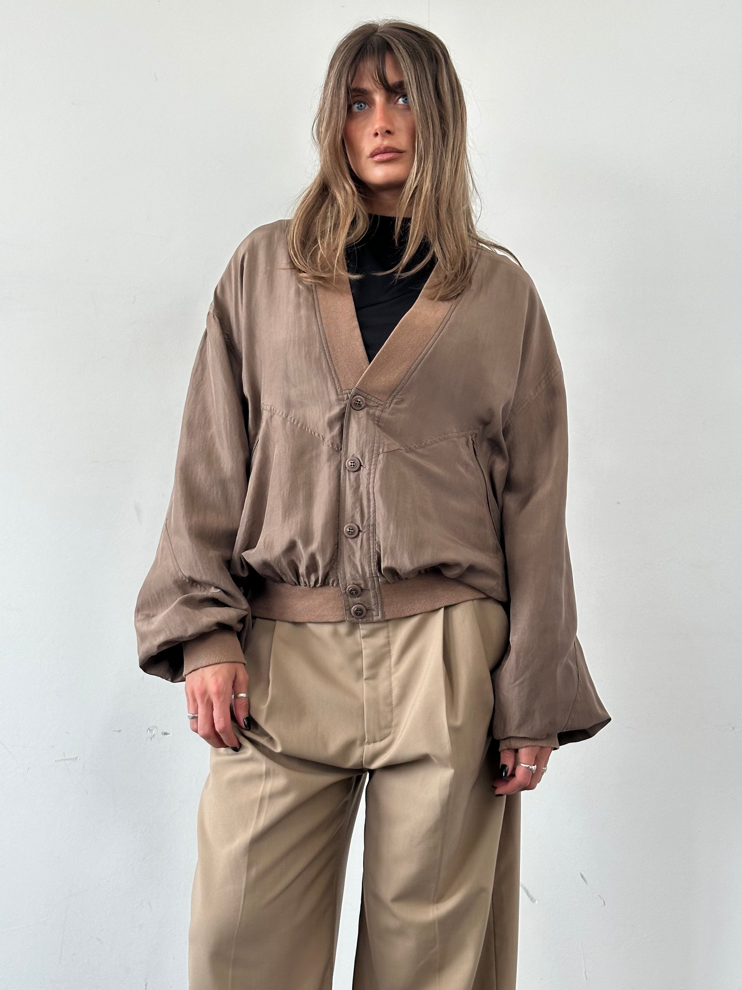 Vintage pure silk bomber jacket in XL with a sleek design, featuring smooth fabric and classic style.