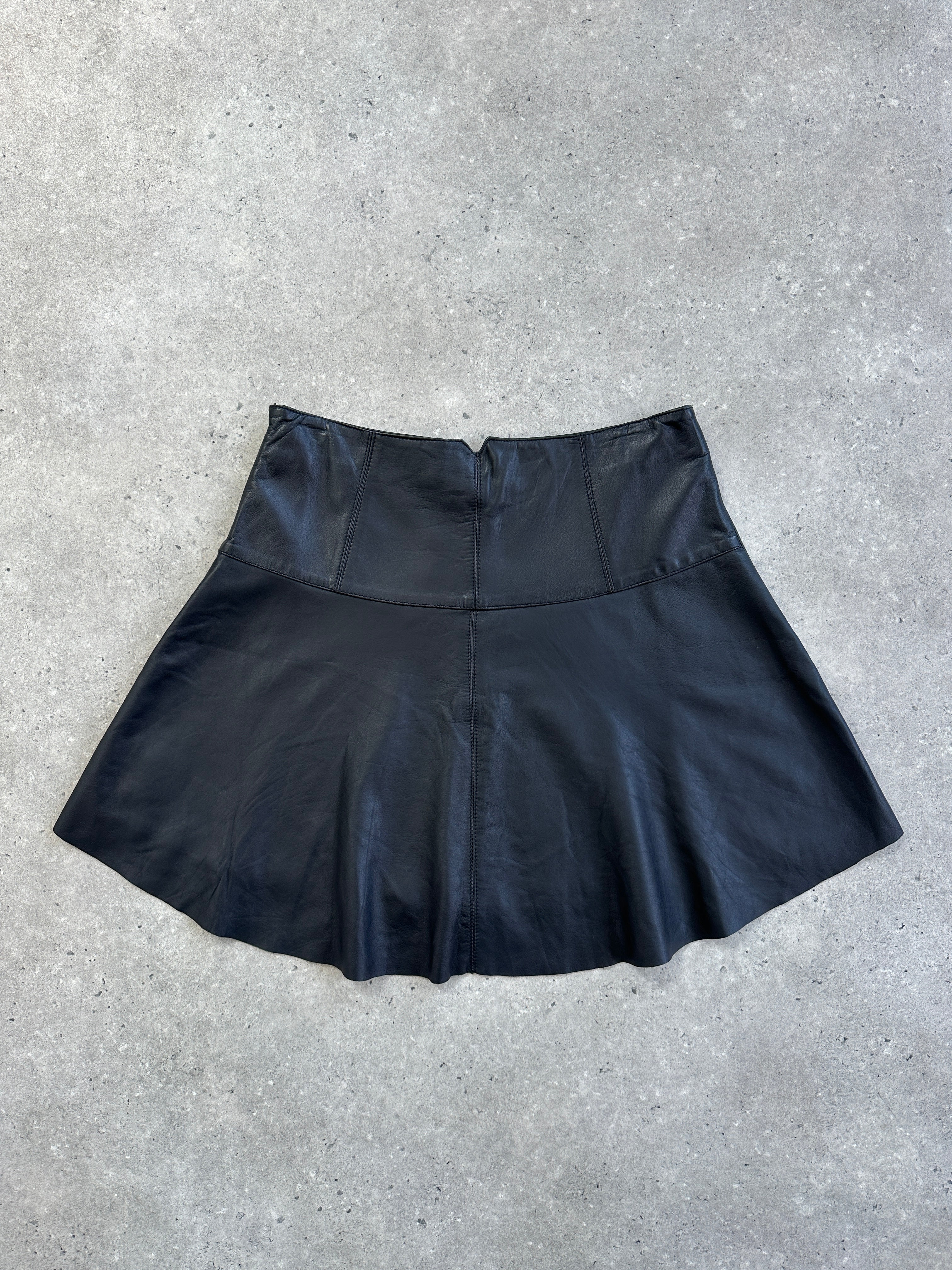 Pinko Italian leather A-line skirt in soft pink, front view showcasing smooth texture and elegant design.