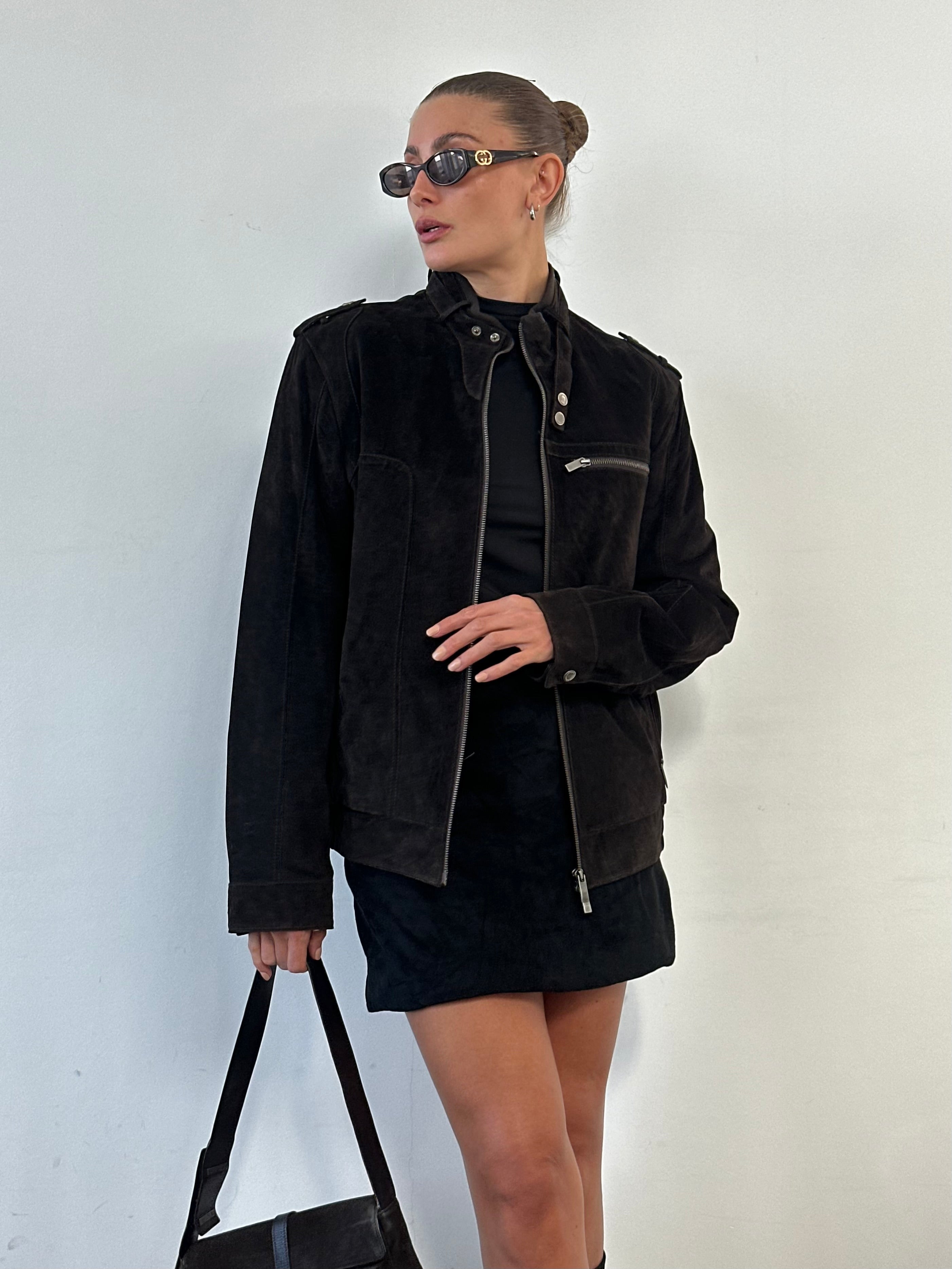 Vintage Italian double zip moto suede jacket in size M, featuring classic style and textured brown leather.
