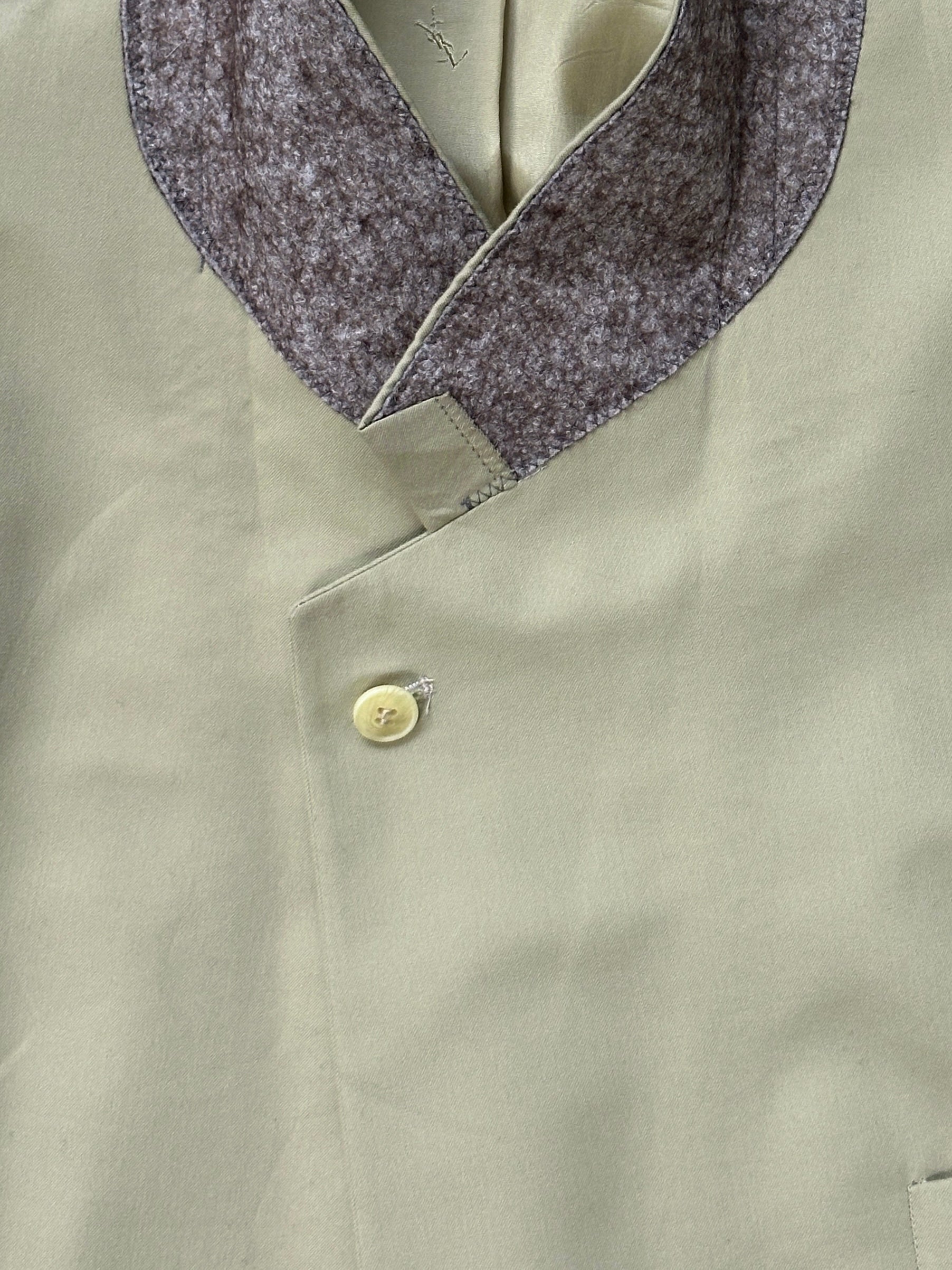 Yves Saint Laurent Pour Homme 1990s high neck single-breasted blazer in size 42R/L, shown in a tailored dark fabric.
